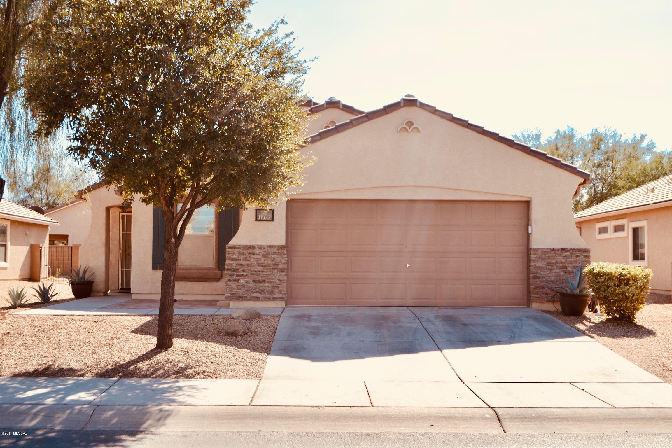 House has been completely updated:newer Carpet, Ceramic Tile, LED Recessed energy efficient lighting throughout, Living Room & Bar Dimmers, Stainless Steel Appliances, new Light Fixtures and Ceiling Fans, NEW Pluming Drains & Fixtures, Granite Counter tops throughout home, Master Renovation, Barn Door & Tile Shower, Guest Bath Standing Vanity, NEW high end garbage disposal, 7 speaker in wall/ceiling flush mounted surround. Kitchen Cabinets refinished & new stainless steel hardware added. Granite, Glass, travertine Kitchen back splash.  Updated landscaping in back yard. Stone pacer patio area, 8ft solid wood pergola, Real Grass, timed Irrigation. New A/C register & solar panels. Front of house is dressed in stone veneer w/ brick paved inlet & updated LED lights. MUST SEE!