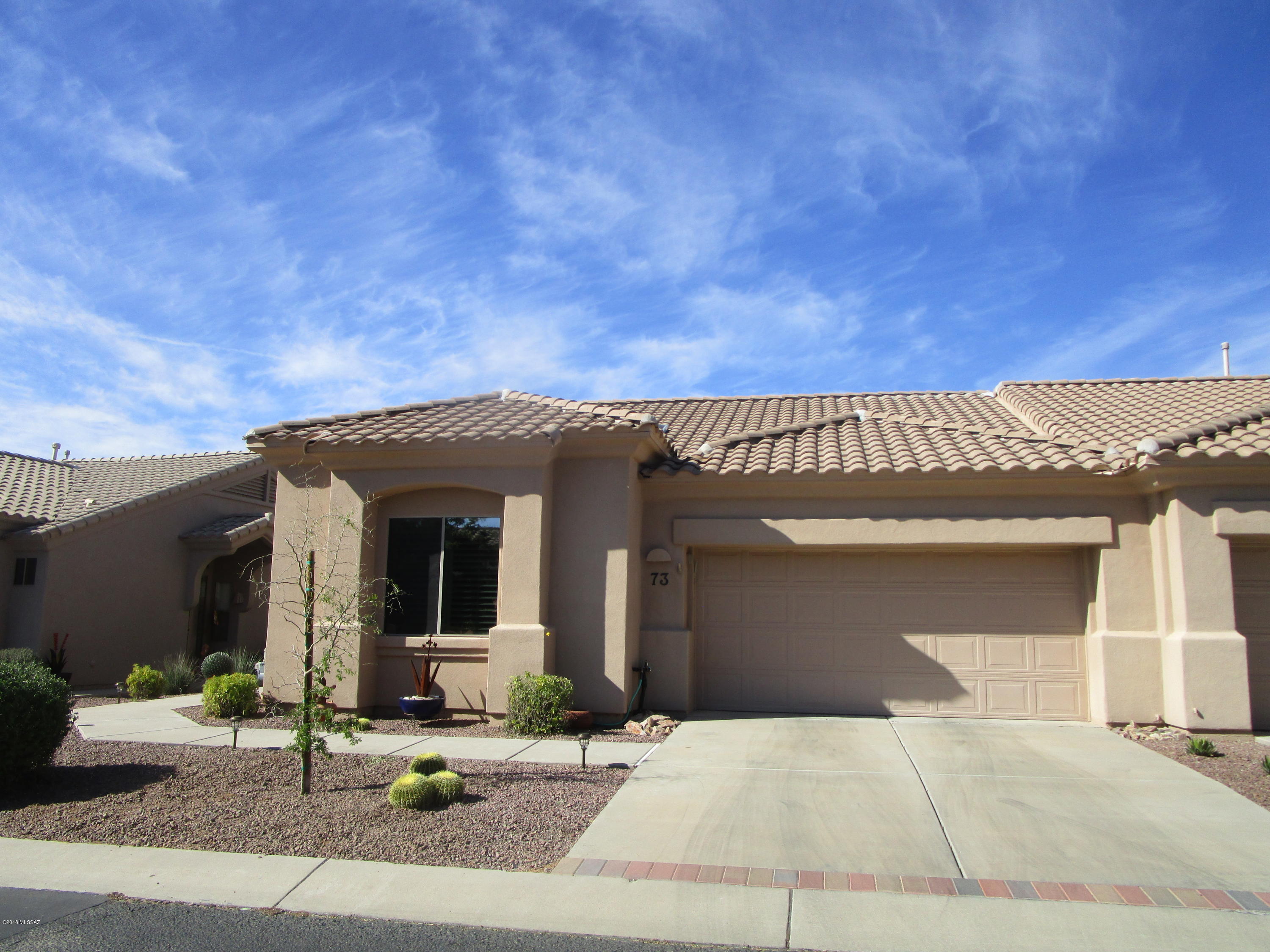 Seller will consider offers between $270K-$290K. Simply amazing beautifully UPGRADED  townhome that looks and feels like a CUSTOM HOME. 2BR/2BA plus DEN, CERAMIC TILE  and WOOD LAMINATE  floors, CUSTOM GRANITE SINK AND GRANITE COUNTERS,, POLISHED MESQUITE WOOD BREAKFAST BAR, NEWER STAINLESS STEEL KITCHEN APPLIANCES, OIL RUBBED FAUCETS AND FIXTURES, ,CEILING FANS, SKYLIGHT,, , meticulously landscaped upgrades in backyard!! $43K in upgrades....Come See! Saguaro Rib Cabinets, PLANTATION WOOD SHUTTERSs, VAULTED CEILINGS, ARCHITECTURAL NICHES, ARCHWAYS, 3 BAY WINDOWS, CUSTOM SAGUARO RIB ENTERTAINMENT CTR WITH ELECTRIC FIREPLACE....SUPER BACKYARD WITH BLT IN BBQ.L GIVES THE RICH LOOK OF THE WILD WEST! HOA OFFERS TWO POOLS, CLUB HOUSE, ROOF MAINT. EXTERIOR PAINT, WATER, TRASH *