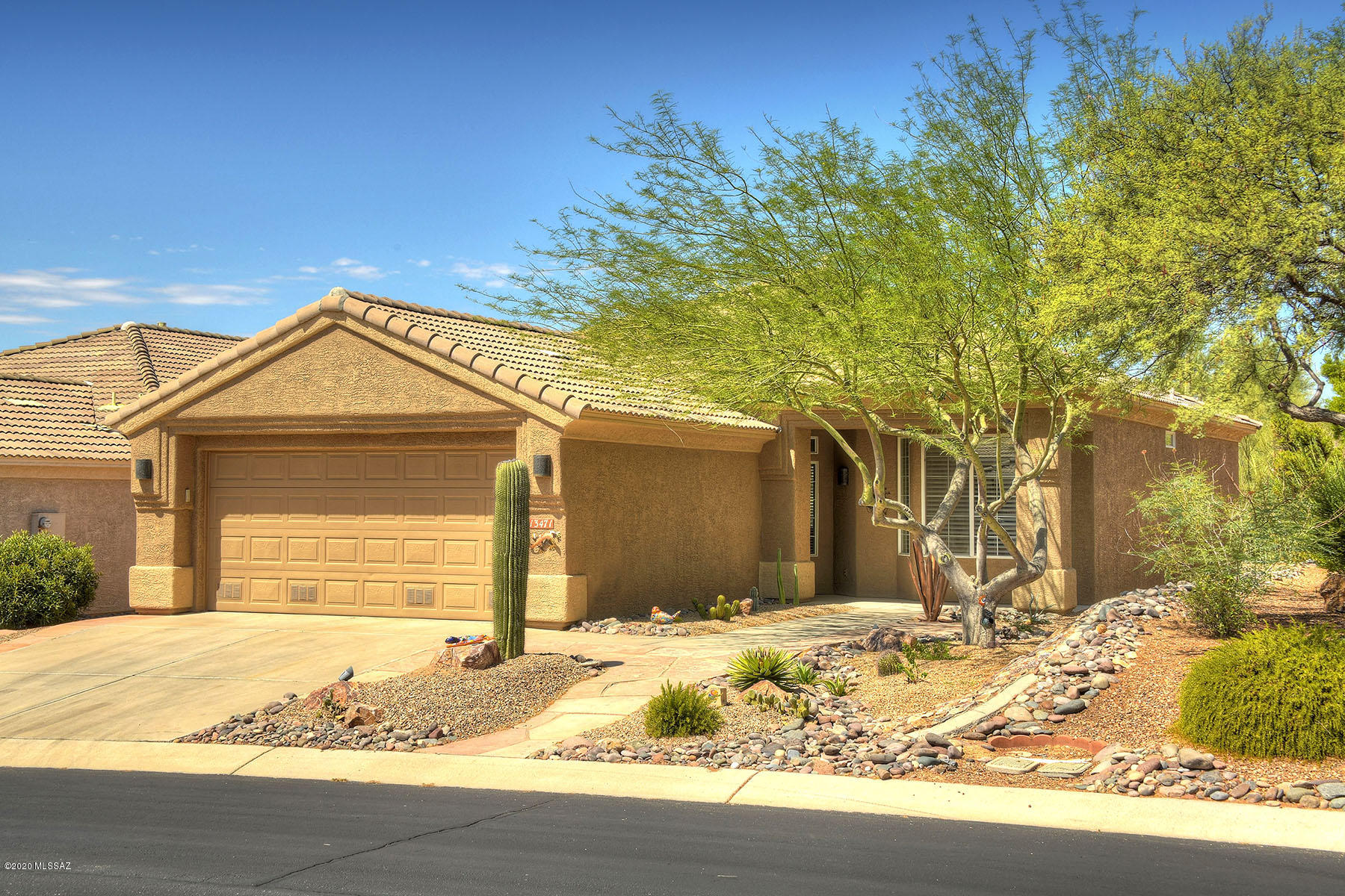 PRIDE OF OWNERSHIP SHINES IN THIS LOVELY REMODELED DURANGO ...NESTLED NEXT TO PEACEFUL NATURAL DESERT & 13TH HOLE AT ARTHUR'S HILL!! Beautifully lndscpd frnt yd w/ flgstn walk ways- Upgrd kit boasts warm decorator touches-newer lowered brkfst bar w/ granite cntrs, grnt sink, stylish bcksplsh, SS appls, new garb disposal & more! Lrg mstr suite w/ cstm paint & coffered ceiling- Mstr bath offers upgrd lighting w/addtl ceiling fan/light fixture, double sinks, walk-in shwr & closets-Guest bdrm w/ bay window & addtl pocket door for added privacy-NEW HVAC & WATER HEATER IN 2019! Central vac, sec systm, hot water recirc, custom blinds, warm paint colors, ceramic & wood tile flooring, cozy gas FP & new french door in grt rm-Ext flgstn patio in back w/ auto pwr shades-Lush desert, sunset & mtn view!