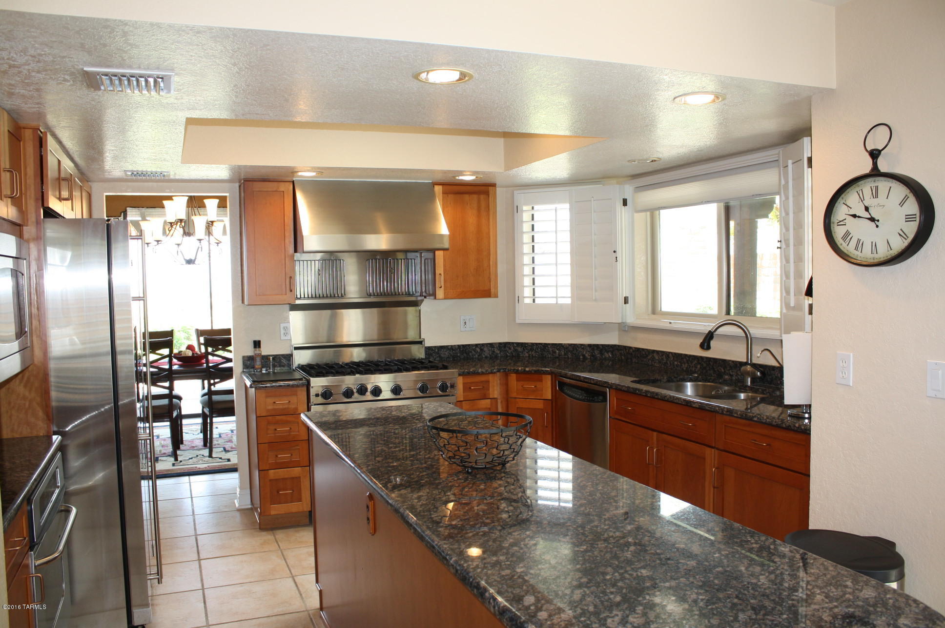 This beautiful 2BD/2BA townhome can be rented either fully furnished or unfurnished. ($1900 unfurnished or $2000 per month furnished, minimum 12 month lease agreement.)   Stunning city and mountain views on a private lot.  Completely remodeled with granite counters, cherry cabinets and SS appliances.  Eat in area and access to covered porch side yard.  Tile floors throughout.  Den is a great room to sit and read your favorite book.  Beautiful master bedroom looks out to the views.  Walk-in shower.  Guest bedroom has its own patio. Community pool! This one won't last long!