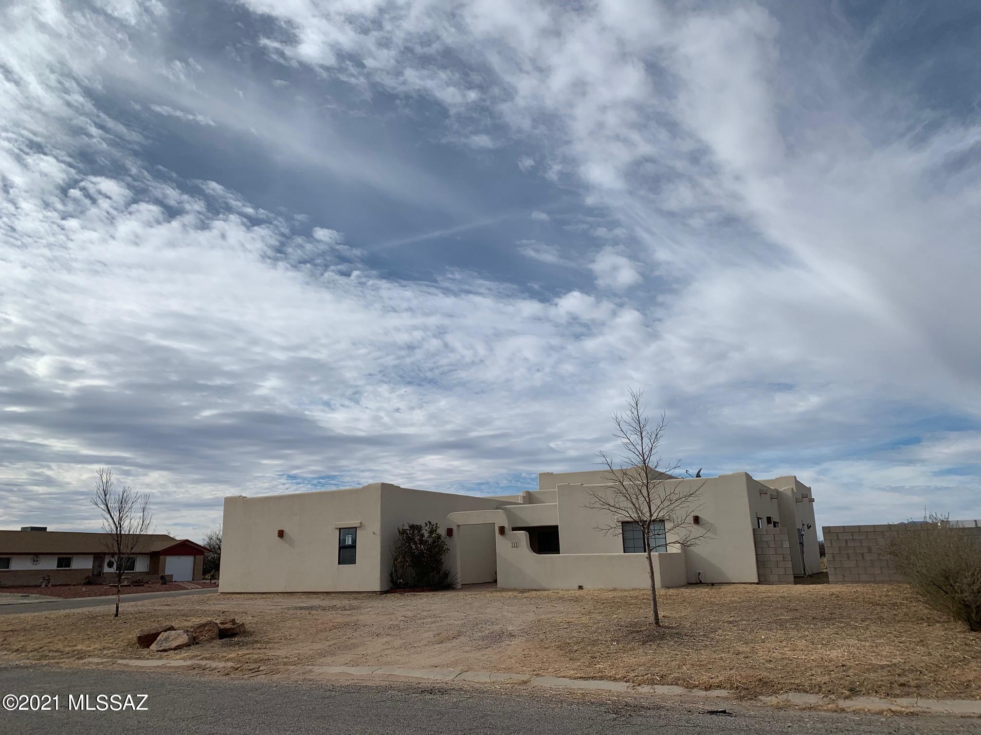 Custom built all electric 4 bedroom 3 bathroom Santa Fe style home built in 2005 with 2252 square of living space. Tile floors throughout the open floor plan design with large kitchen. 2 car garage. Corner lot. Property sold as is. This property may qualify for Seller Financing (Vendee). Flood Zone AO.