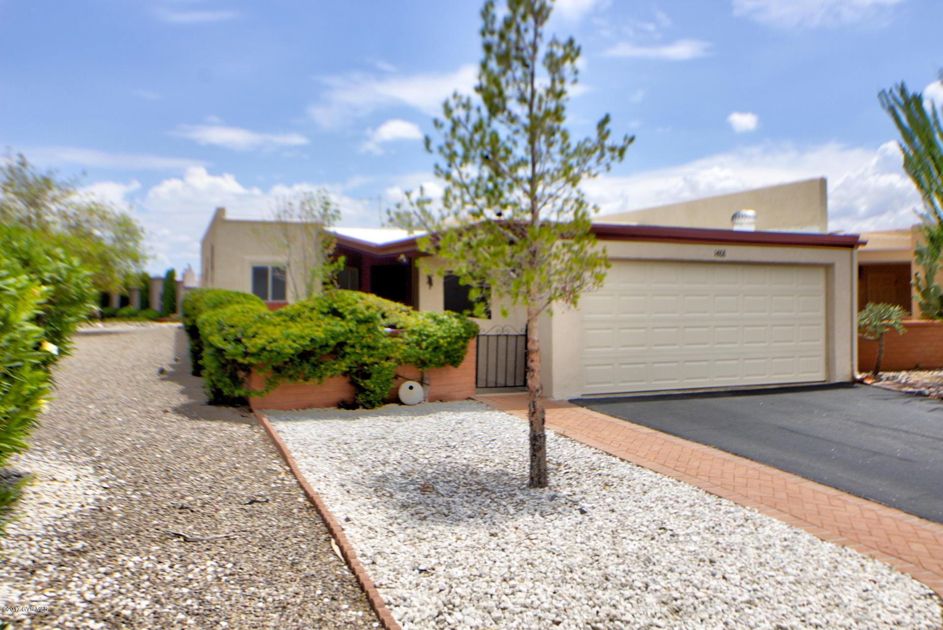 Nice end unit Townhome, 2 BR, 2 BA, Den/Office, 2 car garage with extra storage, large screen back porch, block walled in back yard with mountain views, 2012 new heat pump, termite warranty, No GVR, but available, HOA has pool, Rec room, tennis courts, walking trail & more.