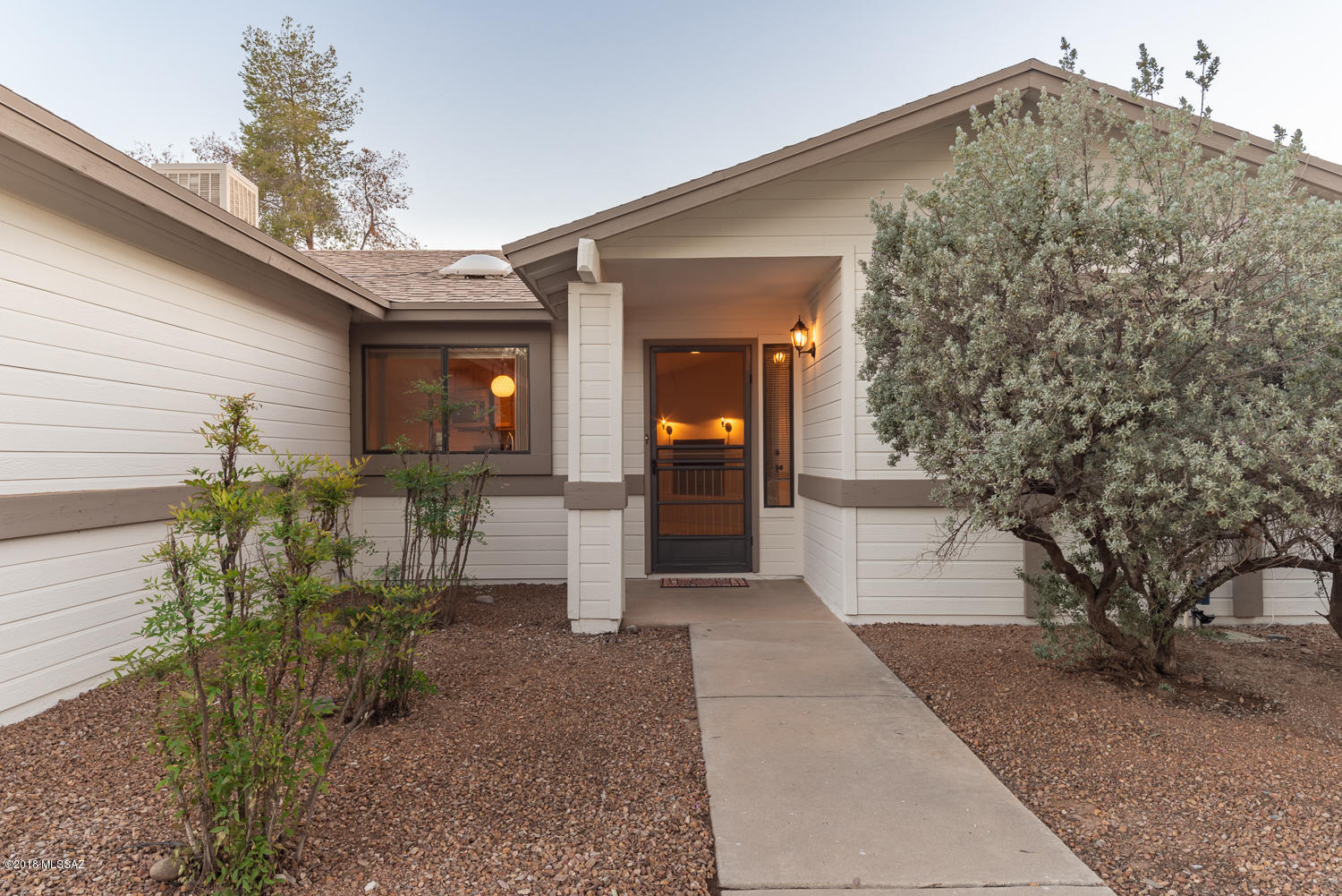 Great location, great home in an established neighborhood. Beautiful 3 bedroom 2 bath home in Northwest Tucson. Home offers new paint, new carpet, new appliances and a cozy fireplace. AC unit recently replaced! You will also enjoy the extra large patio and low care yard. Move in ready and ready for you to enjoy! Agent/Owner