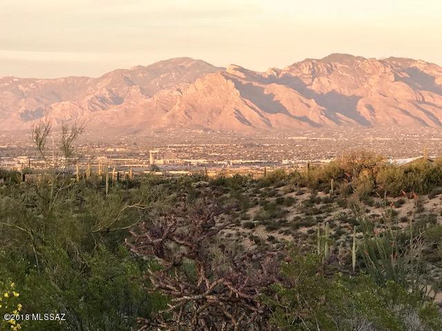 3.3 acres of horse property nestled with a Hilltop building site with plenty of room for a guest house in the foothills of Saguaro National Park! Unobstructed views also of the city and the Catalina mnts, abundant wildlife and lush desert surroundings. Underground utilities (including City Water) available at the street.  Gorgeous area of Custom home, only 350' from Saguaro National Park!  Seller paid $198000,so priced for quick sale!  Seller is a Canadian Citizen so buyers must agree to sign & complete a 8288-B form prior to closing in order for the seller (foreigner)to recoup a mandatory 15% withholding tax. Will be no additional cost to the buyer.North Boundary to this lot has just been flagged.look under ''documents'' for survey's,water info + more!
https://www.youtube.com/watch?v=IOL