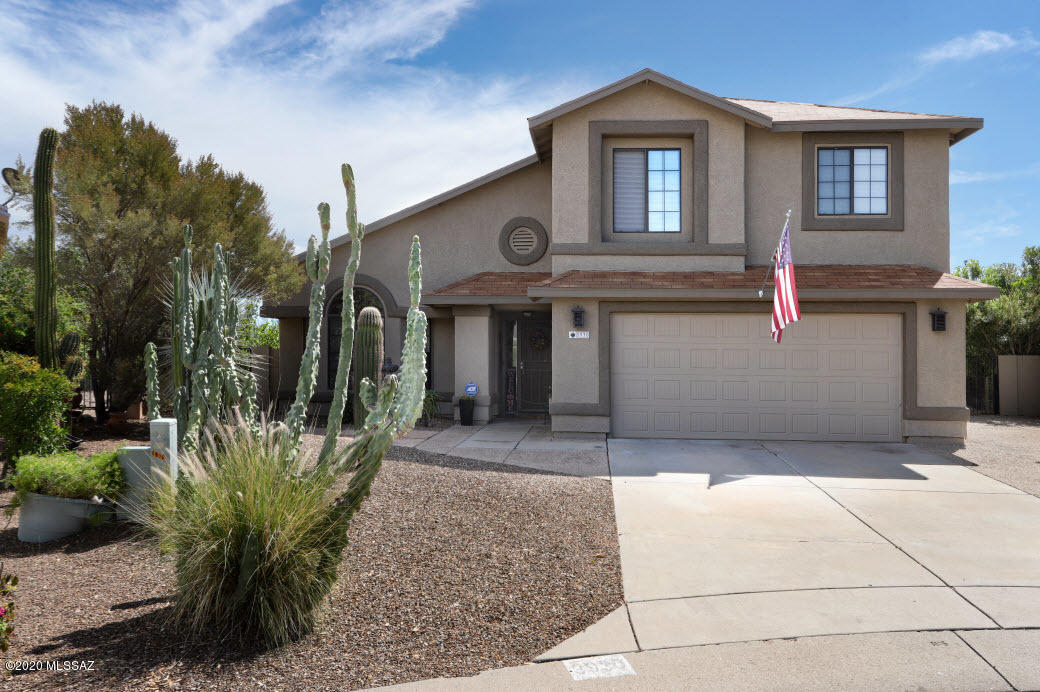 WOW!! You are not going to believe the upgrades and remodeling this home has to offer. 4 bedrooms, 3 bathrooms, and a master suite you will never believe. Every room of this home has been upgraded and/or remodeled. 
 Kitchen remodeled double pantry cabinets and butlers pantry. Washer/Dryer included. Home has TEP solar panels for discounted electric bills. 

Master bedroom suite is massive with custom master closet that is the size of a bedroom. Extra-large glass shower with dual rainfall shower heads and separate jetted tub with a view. 

Custom TV entertainment center with surround sound speakers. Double gate, extra-large lot that backs up to wash. Mountain views. 

Home is unfurnished; photos shown are when home was staged.

Owner/Agen