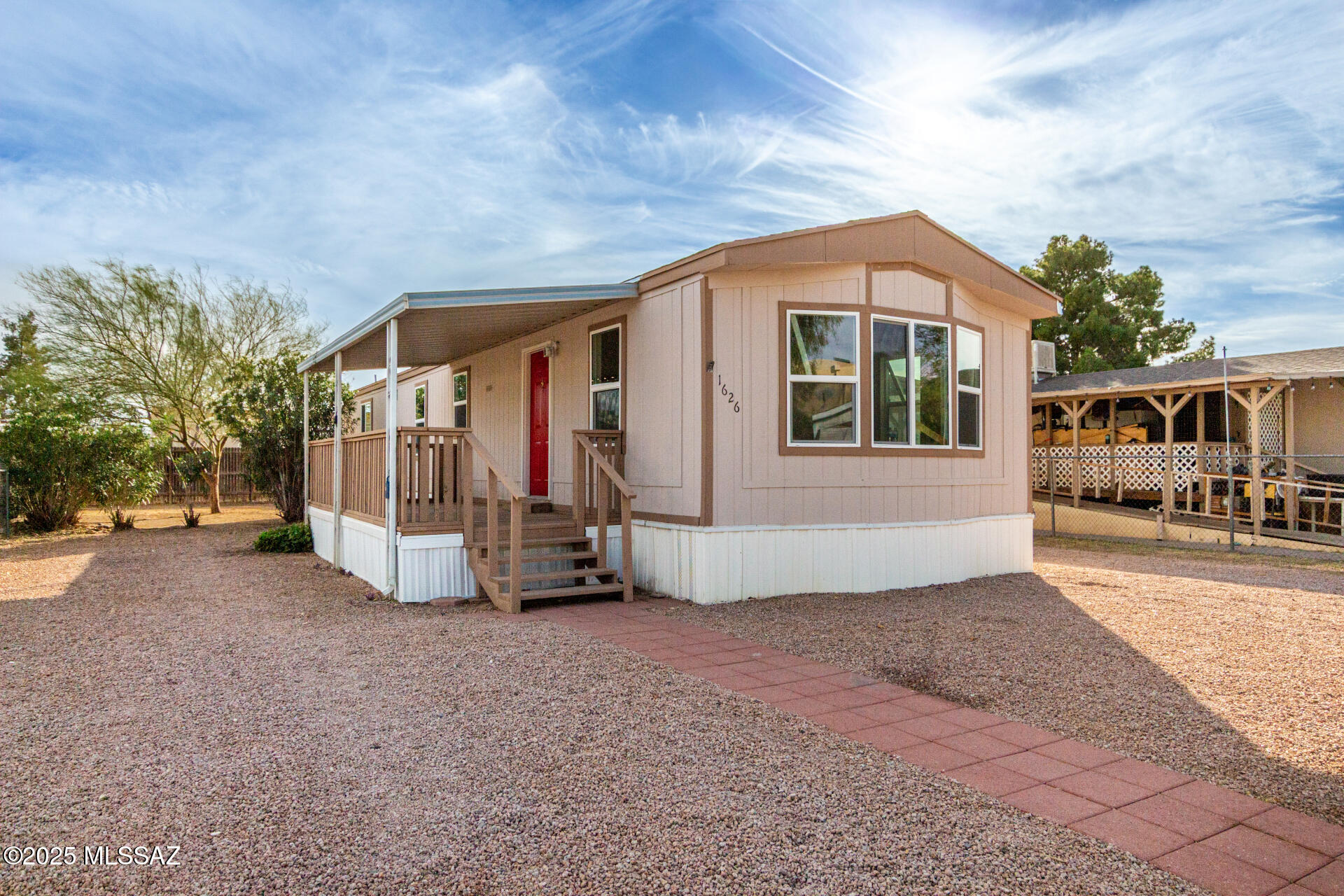Seller to accept or counter offers between 200,000 - 210,000. Welcome home to this newly remodeled and refreshed 2 bed, 2 bath manufactured home offering comfort, style, and affordability. Thoughtfully updated with modern finishes, fresh paint, new fixtures, and inviting living spaces, this home is truly move-in ready. Enjoy a bright open layout, a well-appointed kitchen, and two spacious bedrooms for easy everyday living. Located close to all of Tucson's great amenities—including shopping, dining, parks, and major roadways—this home delivers convenience and value in one complete package. Perfect for anyone looking for a clean, updated place to call home.