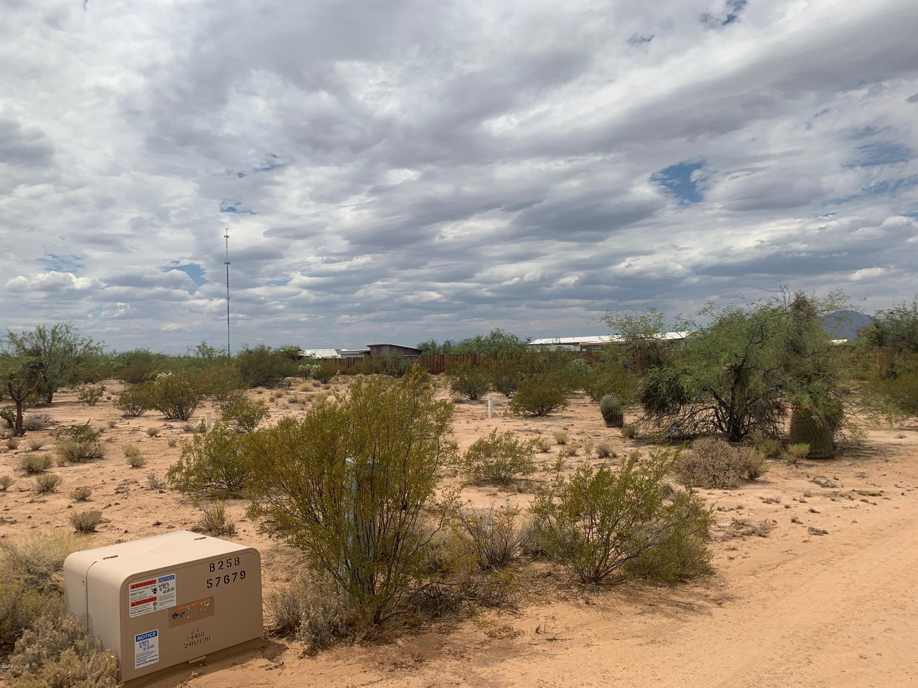A Beautiful 1 acre lot, perfect for a home away from the stress of the city. This area has some of the best starry nights with little light pollution, more stars than you could possibly imagine. Three Points offers shopping and restaurants, fire dept. What ever your use would be this is a great chance to own a slice of our beautiful desert