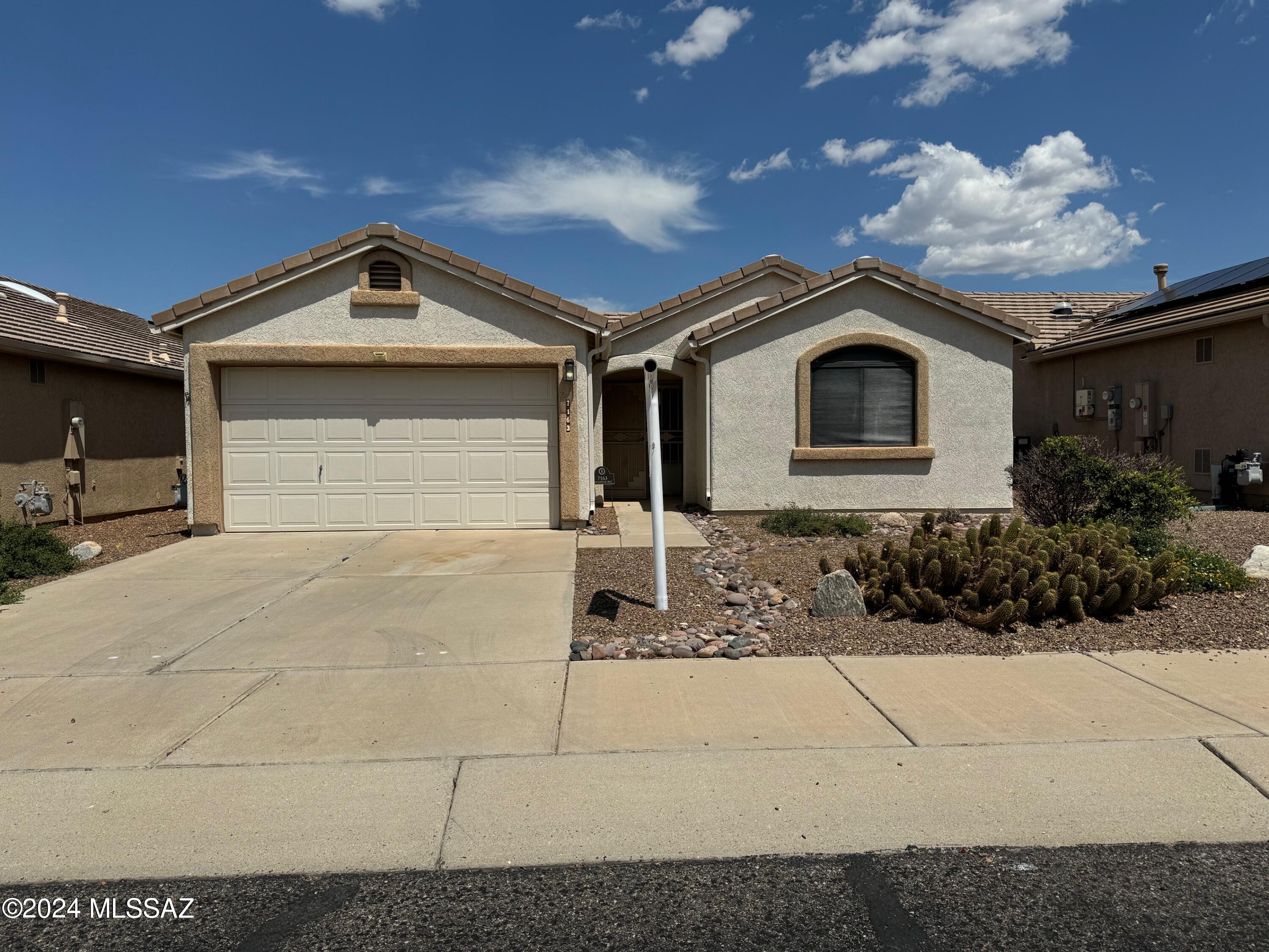 Welcome to this lovely light and cheery move-in ready home nestled in The Cove at the Voyager RV Resort.The charming great room is a blend of comfort & convenience that leads to a delightful screened Arizona room with mountain views.The split floor plan boasts a roomy primary bedroom ensuite and a large walk-in closet while the second bedroom has an ideal Murphy bed for guests and a desk. This adorable home features one year new Andersen windows, a 3 year tile roof, 6 mo.old owned full home water softener/purifier, new garbage disposal and microwave, while the AC/Heater has a renewable warranty. Enjoy cool summer days with owned solar & always feel secure with the Simply Safe alarm system. Come & embrace an active lifestyle while making lasting friendships.