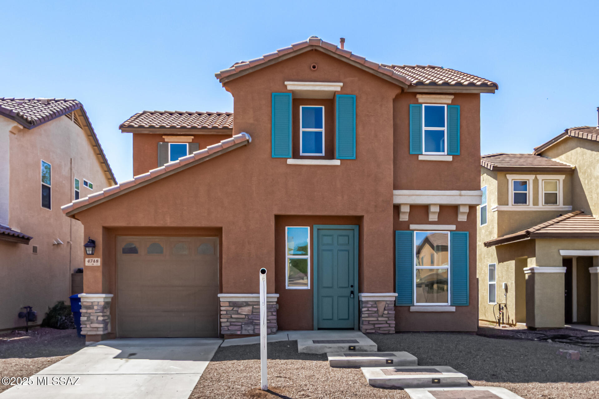 Contemporary 2 story Single family home.