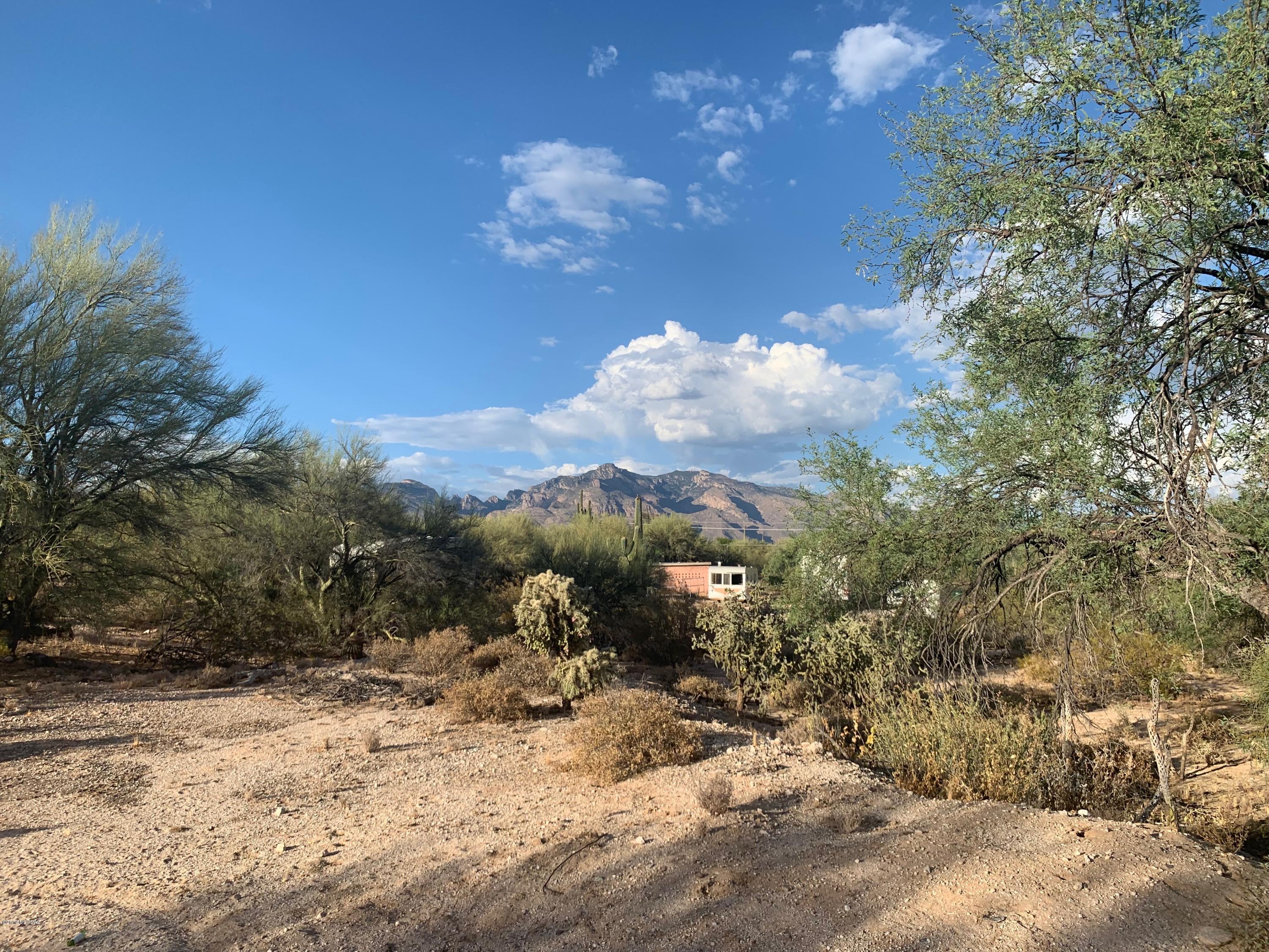 Come see this beautiful land lot in Casas Adobes, with great mountain views on 0.83 acres!  You can purchase all 4 lots for the full 7.96 acres, or can purchase the lots individually (5.48, 0.83, 0.83, and 0.82 acres).  There is no HOA.