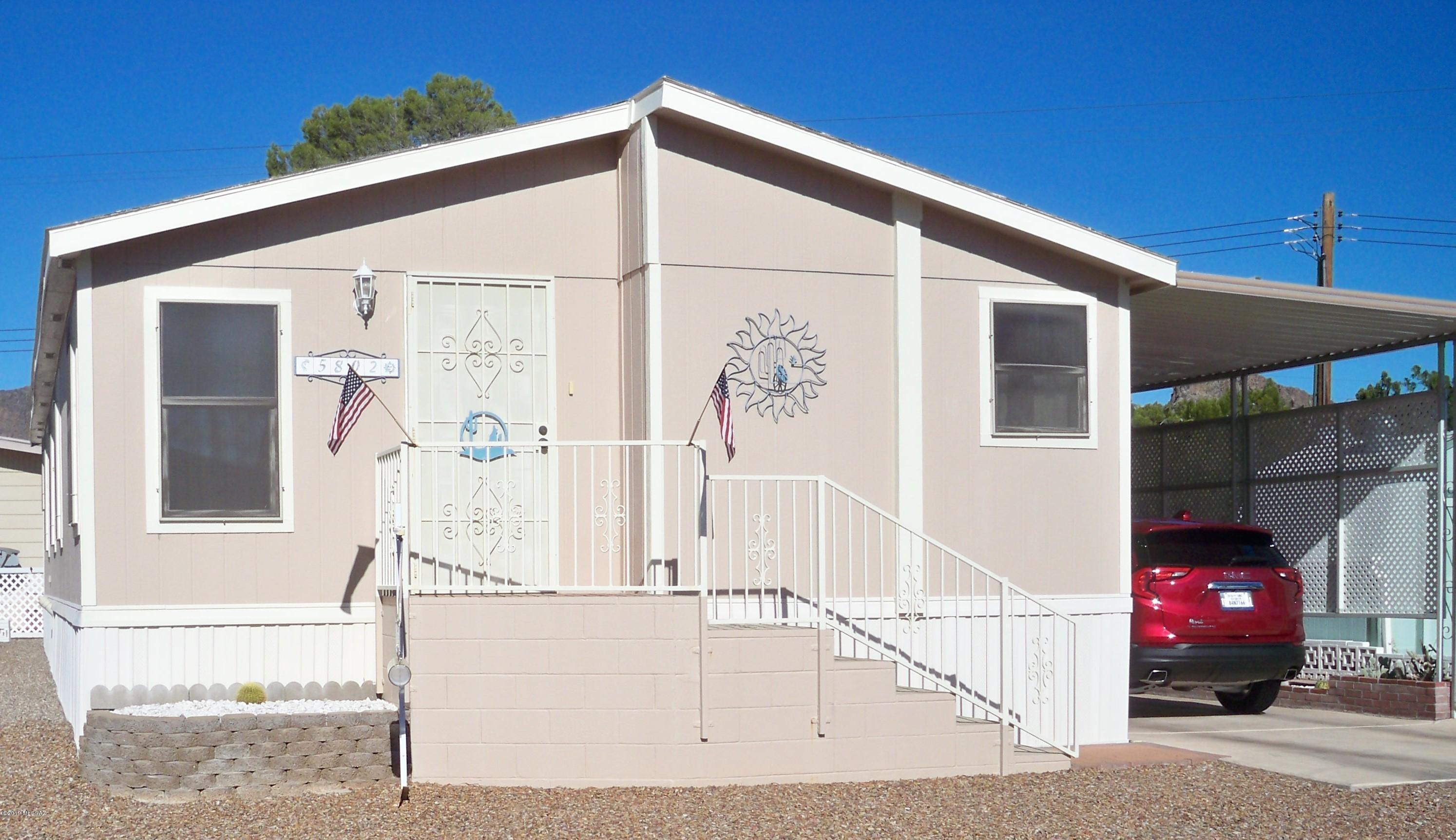 Well taken care of financeable manufactured home. 1224 s/f home fully furnished all you need are your personal items. Kitchen has lots of cupboard space, refrigerator was bought in 2014. Large master bedroom with walk in closet and extra large master bath. 2nd bedroom is a great guest room and 3rd bedroom could be am office,man cave or hobby room. Dual pane windows through out. Laminate and ceramic flooring, heat pump, ceiling fans, vaulted ceilings--Large 10 x 12 shed/workshop can park golf cart inside--This is a must see home. Community is a 55+ and over. The HOA covers Golf,
 pools,spa,tennis,pickle ball,club house,trash pick-up and much more.
THIS IS A 2000 CLAYTON 51X24 MH