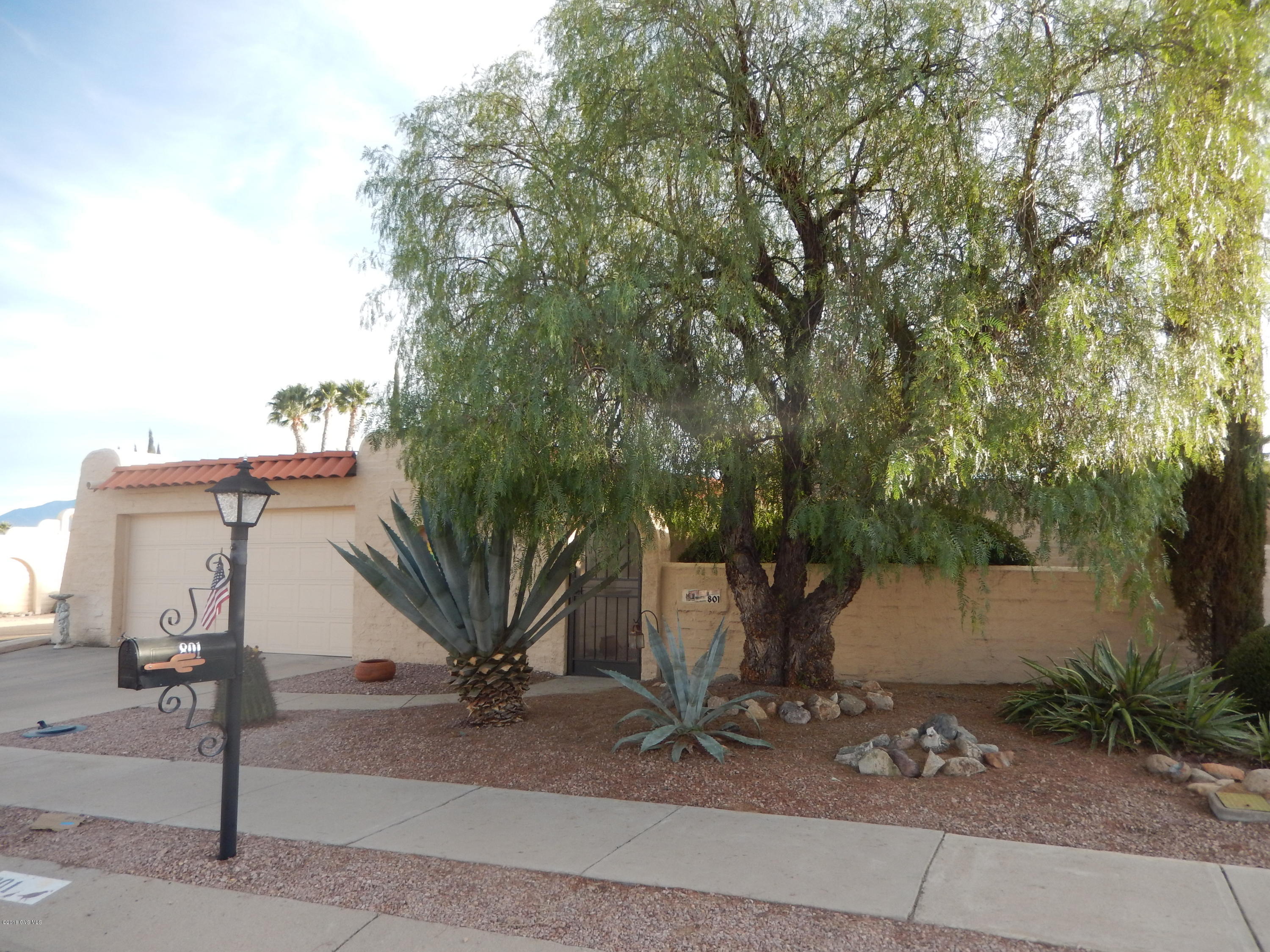 SPACIOUS 3 Bedrooms plus AZ room located on a corner lot with mountain views. Enjoy the tile floors and atrium providing light and openness. The den and guest bedroom have convenient built-ins. Other features include wet bar and plantation shutters. The garage is completely enclosed with storage. Roof warranty, HVAC contract, & termite warranty.