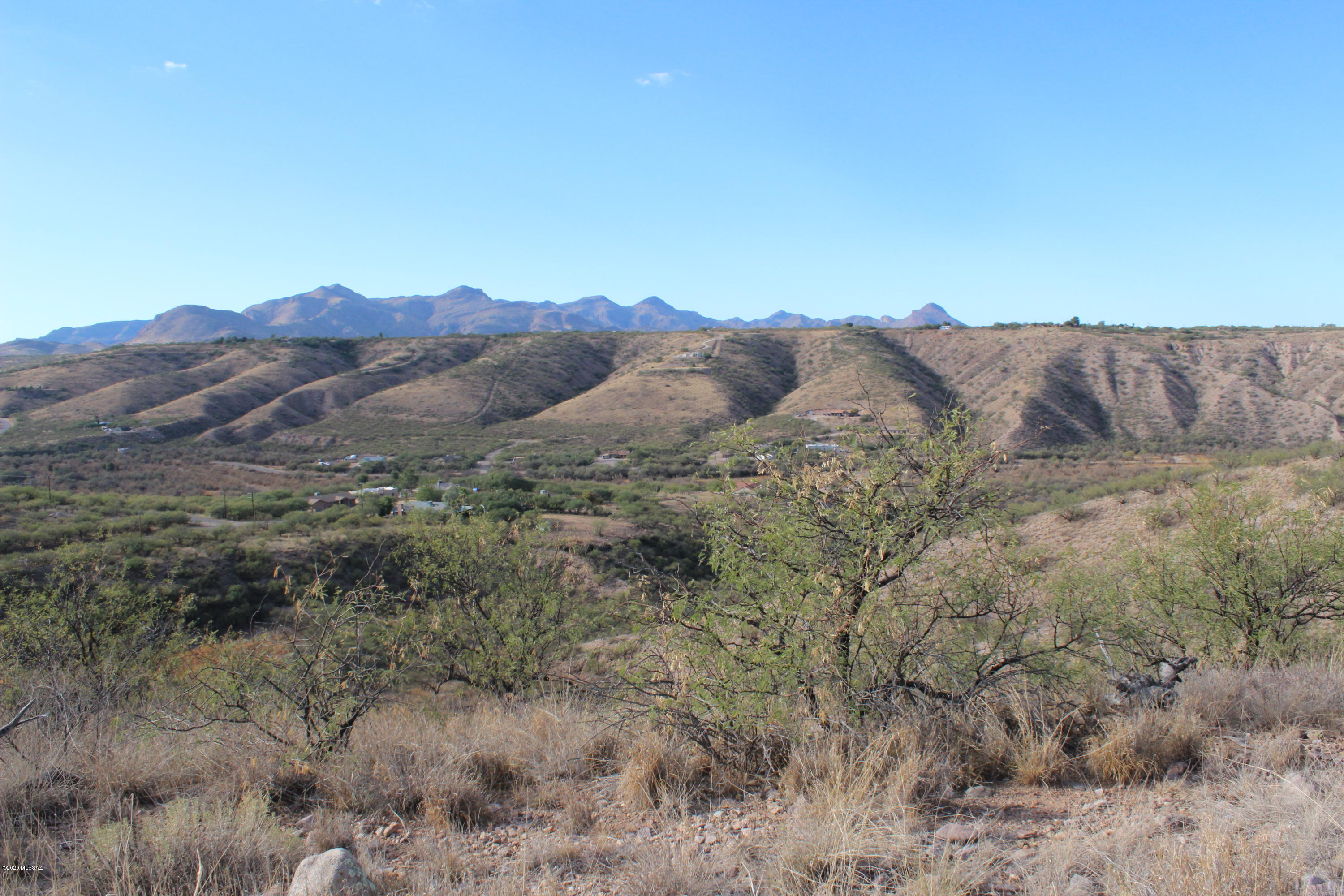 Hello Country Living! Own your very own 2.24 Acres & Build that Dream Home. Paved roads to your lot surrounded by beautiful mountain views. Easy access to I-19 for easy commute either south to Nogales or north to Tucson. Just a few miles away from our Artist town of Tubac. Golf, shopping, restaurants and so much more. Rio Rico is growing-be on the start of this beautiful community. Just south of Green Valley for golf and fun amenities. Rio Rico is surrounded by beautiful mountains, hiking & day trips to Sonoita Wine Country, Patagonia for boating, fishing and swimming. Buyer to perform all due diligence regarding land boundaries, building & zoning rules as well as location and availability of water & electric during inspection period. no land survey