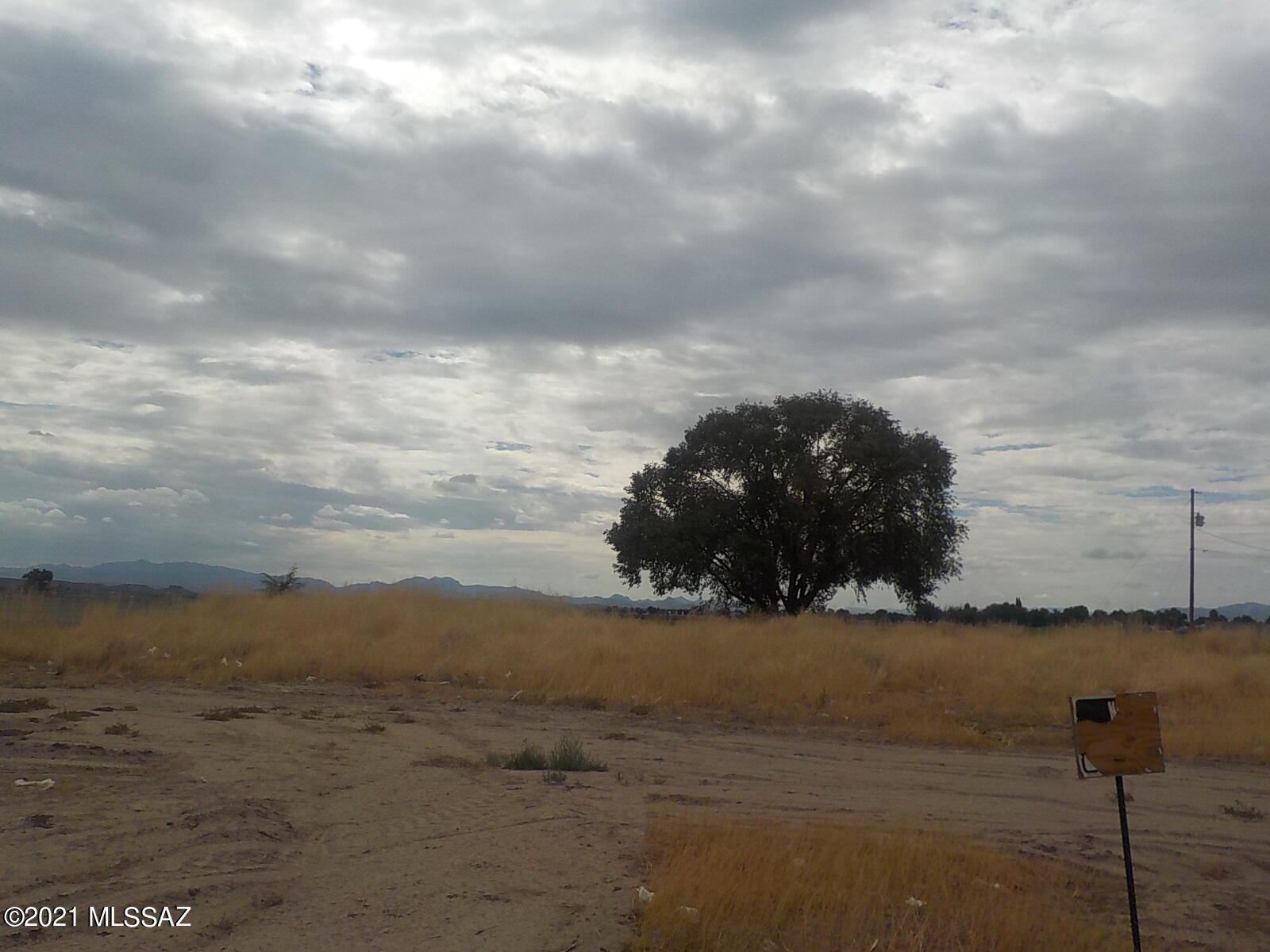 This nice flat buildable lot is ready for your dream home, has city water, septic and electric already in place. Beautiful mountain view, not far from town.  Price to sell.