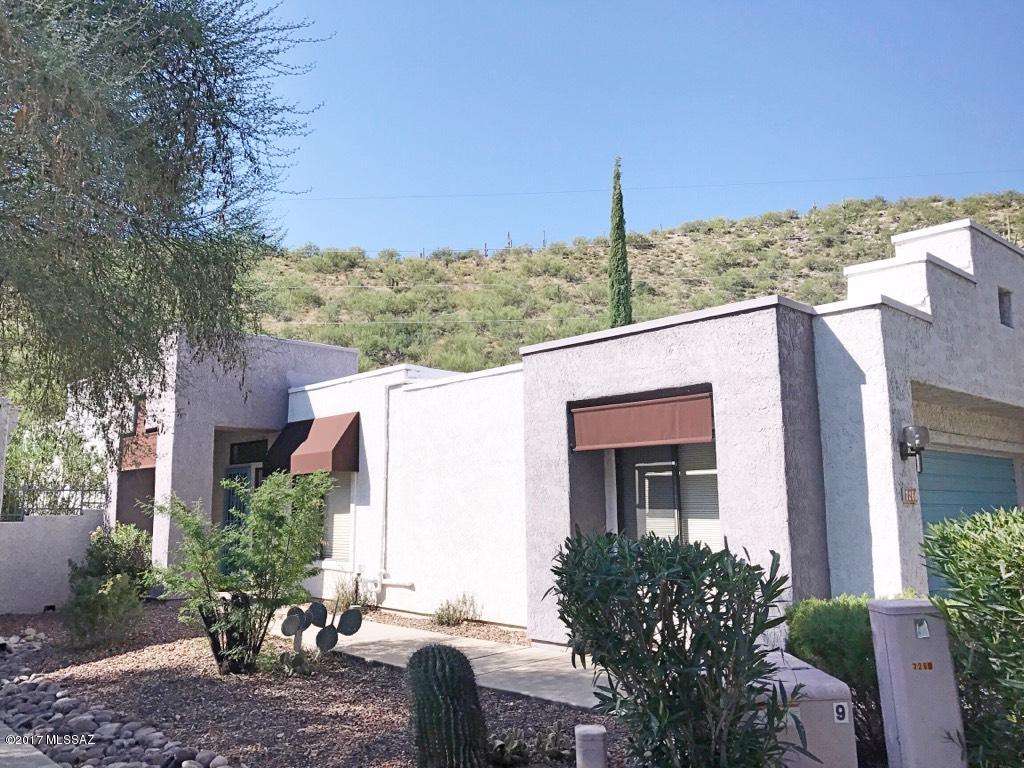 Contemporary townhouse nestled into the heart of Sabino Canyon Valley. Located at the on a quite cul-de-sac backing to desert common area this home boasts privacy and quite yet is just mintues from shopping, restaurants,and Sabino Canyon. From the moment you walk in you are greeted by high ceiling, tons of natural light and an open floor plan. No wasted space here don't let the sqft fool you this home is spacious and has storage galore. Kitchen Living and Master bedroom all open onto the private backyard and patios. Community Pool.