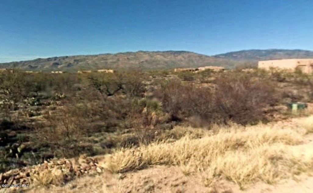 Over an acre and a half of land with gorgeous views in a gated community! Please note all of the following: Septic on-site. Water: Saguaro Water Company. Tucson Electric Power, Southwest Gas, and Saguaro Water service the area, but were unable to verify connection to the lot. Area serviced by septic. No septic tank installed yet. Buyer would have that installed by their builder after COE.Buyer to verify all.