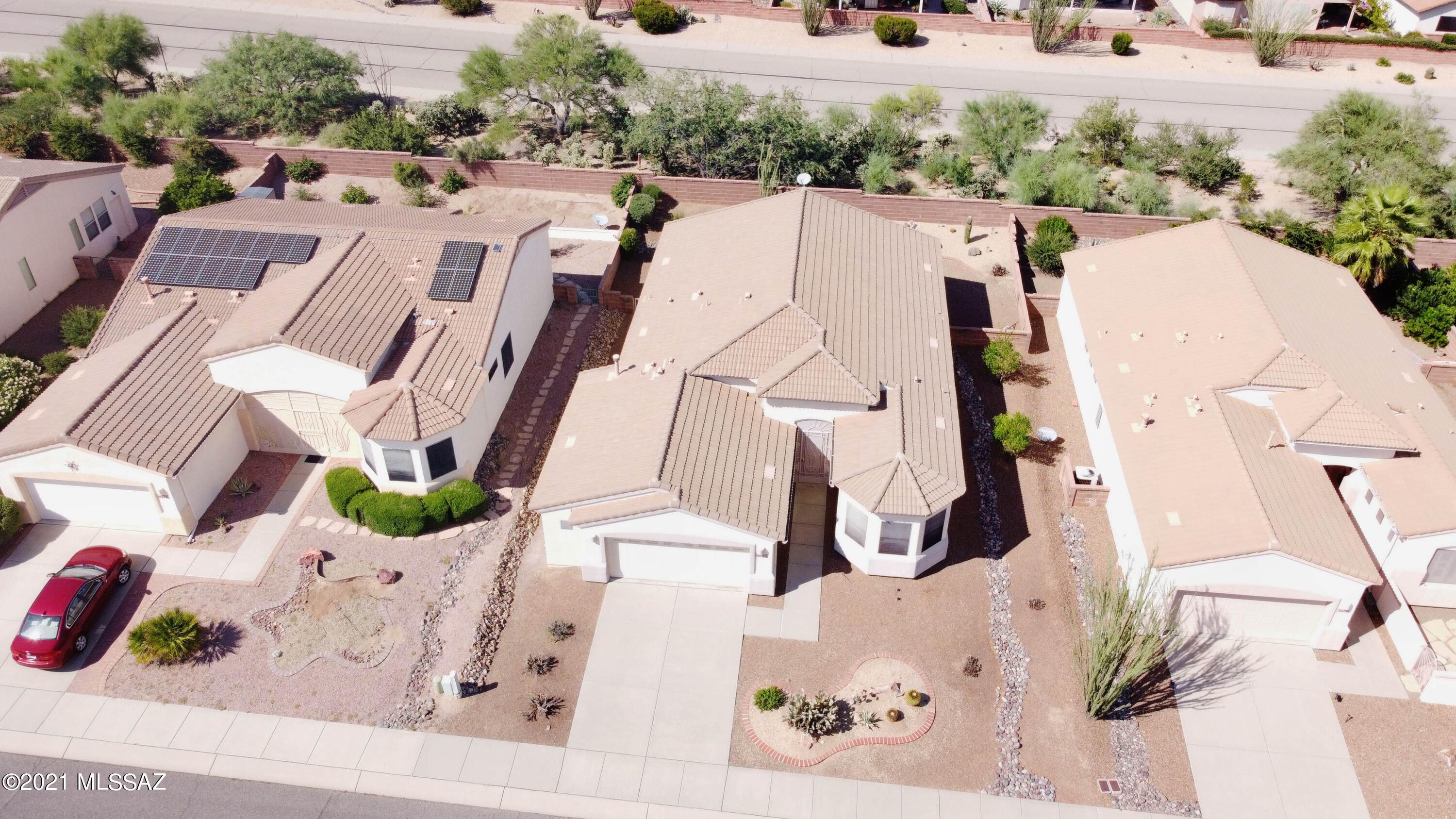 A Las Campanas Beauty, Great Room, 2 Bedrooms (Spilt), Open Den, Hobby Room and a Huge 2 1/2 Car Garage. Bay Windows, Granite Countertops, Tile Floors, Custom Paint, Fans, Newer HVAC and many more nice features. Very Peaceful Back Yard, Your own Private Retreat. Must See this Home.