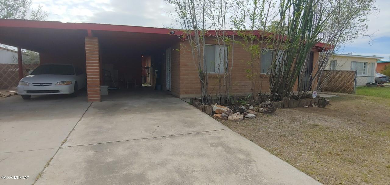 This is a wonderful investment opportunity for an investor, flipper type. This house has quite a bit of deferred maintenance prior owner in very bad health.Repairs to include: roof & ceiling repair, mold remediation, needs new flooring,and various cosmetic attention, when all is said and done, this house will be Sweeet!! Nice big back yard,front yard is low care, covered 2 car carport,completely chain linked, where in the back yard, you will find several mature mesquite trees, built in bbq at back porch. Huge family room with cozy fireplace. This home has a lot of potential! When house was purchased in 1995, we have the appraisal stating 1637 SQ ft. All utilities are currently turned on.  Sold As Is, seller unable to do any repairs. Very close to I-10 as well.