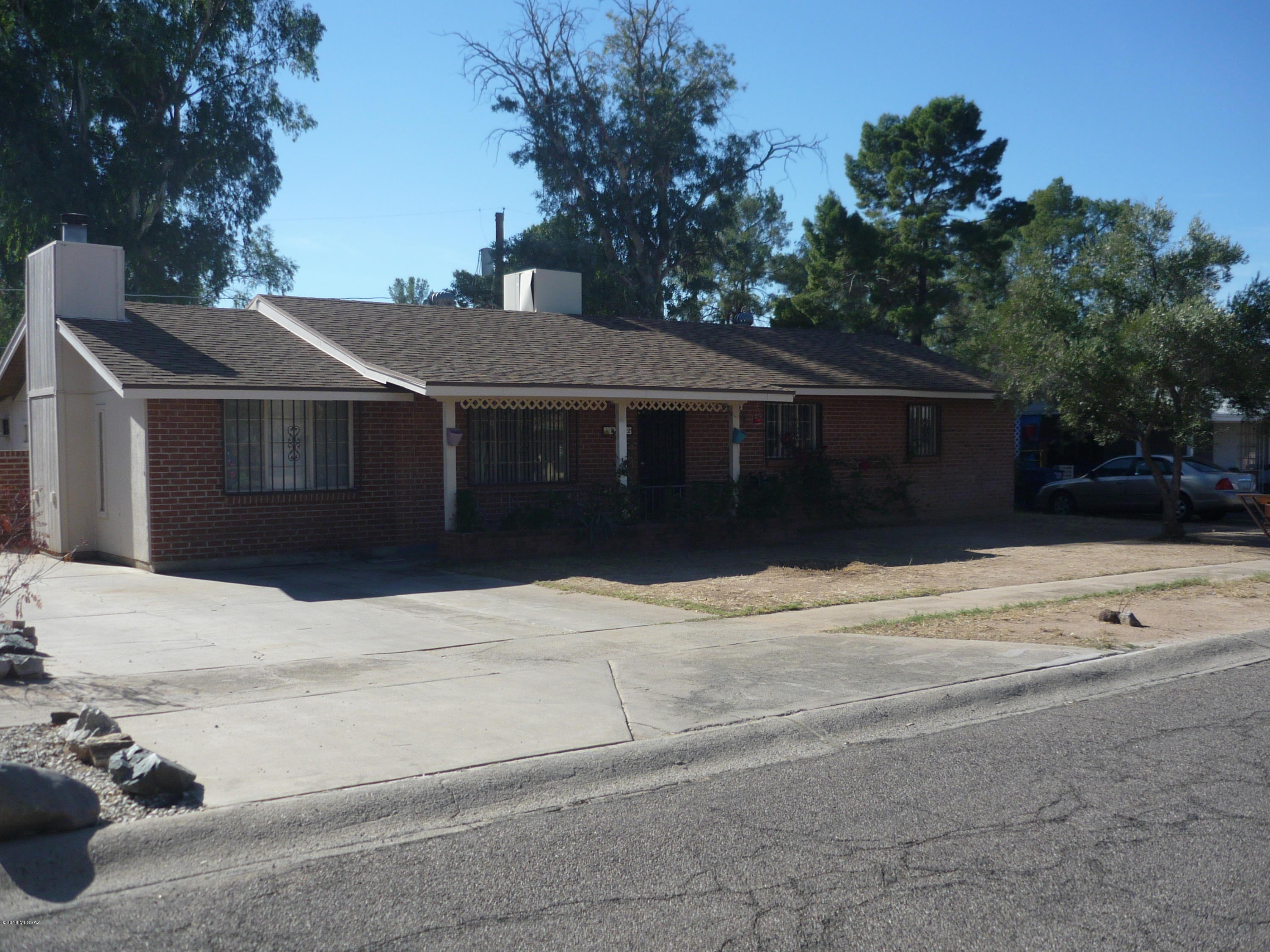 Updated 3 bedroom, 2 bath home. Oak cabinets in kitchen, built in microwave, refrigerator, dish washer,gas stove, dining area & living area with fireplace. Laundry room with washer and dryer and lots of built in cabinets + drop down table to fold clothes. Central A/C in main house.
Separate room has been an office w A/C window unit, also a built in safe,could be playroom, etc.  Large back yard w block fence.  Close to shopping, bus lines, schools.