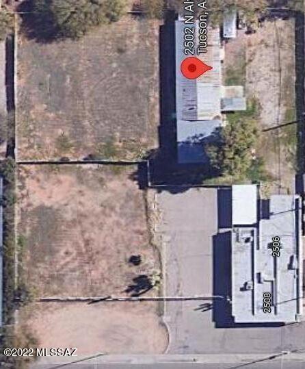 Greta re-Devolvement opportunity. Just off the hard Corner of Grant and Alvernon, North side of Grant behind Wal Mart with the Alvernon Frontage, 1.32 acres. Currently has a 4004 sq ft retail building and a large garage on 1 lot. This property is 2 separate lots being sold together as one. Over 200 feet of Alvernon frontage. Sale consists of tax code 110-07-413A & 110-07-412B. Said 4004 sq ft building has had a fie.
