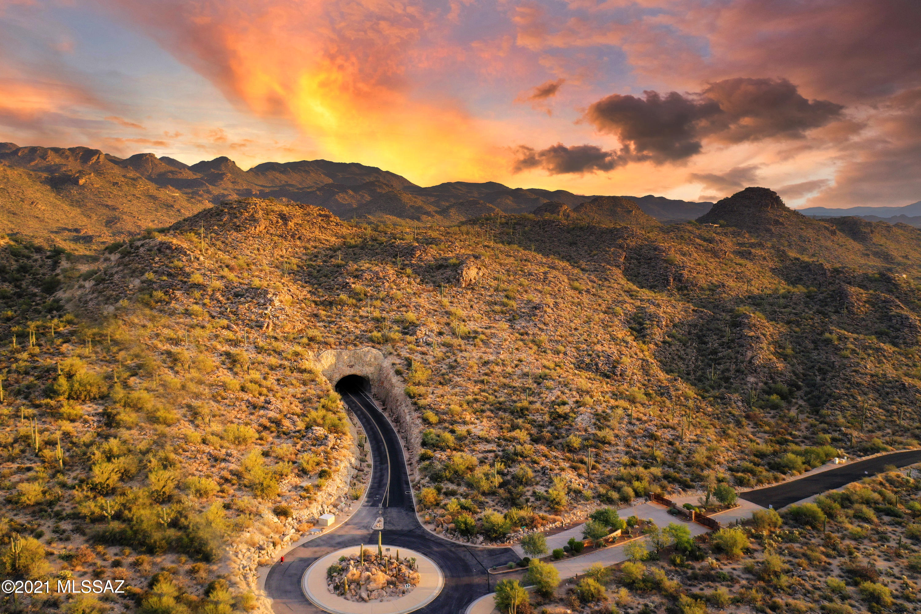 Perhaps The Most Unique Luxury Community in Arizona, Saguaro Ranch Offers the Ultimate in Privacy & Pure Desert Beauty. From the One of A Kind Tunnel Entrance, to The Majestic Views & Thousands of Saguaros,Its Hard to Find A More Dramatic Desert Setting.This 5 Acre ''Build Friendly'' Lot Includes The Added Value of Time & Money w/ Site Work Complete,Including Driveway,Building Pad, Pool & Spa at Gunite,Water & Electrical/Gas/Cable Sleeving, to The Building Pad & Fire Dept Stand Pipes. The Completely Remodeled Saguaro Ranch Owner's Club Offers Workout Facilities, Lap Pool, Swim Up Bar, Mens + Women's Locker Rooms, Social Areas, And More.Close to World Class Golf Courses,Unparalleled Hiking & Biking, The Ritz Carlton Resort & Access to I-10 For Convenience of Both Tucson & Phoenix Airports.
