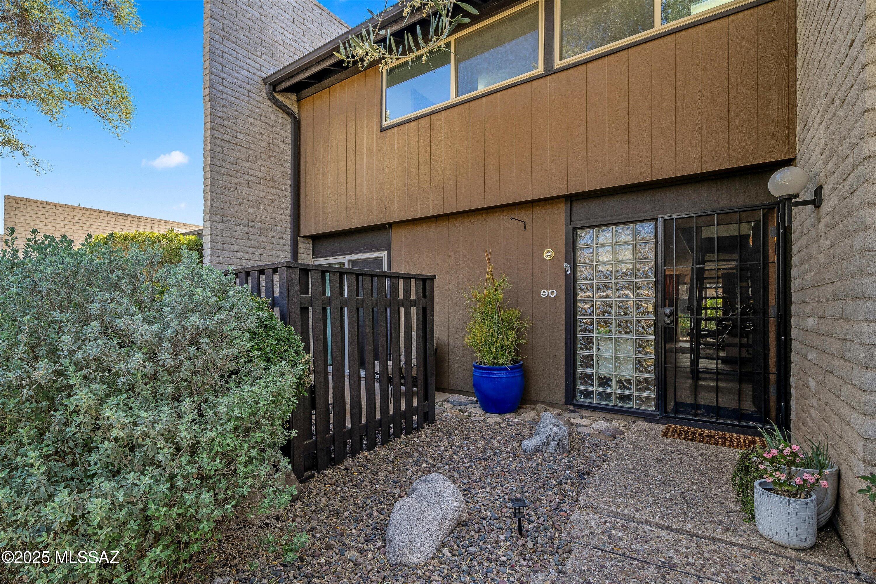 **Range Priced $299,900-$315,000** Discover timeless design & unbeatable convenience in this mid-century desert modernist townhome located in the historic Orchard River district. Designed by renowned local architect Robert Swaim, this stunning gem is nestled on a former pecan orchard in a lushly landscaped community. The two-story home blends classic style with modern updates — all in a prime central location near Fort Lowell Park.
Love to walk or bike? This community sits right next to The Loop's entrance, offering immediate access to Tucson's beloved multi-use path.
Inside, enjoy hardwood flooring downstairs & eco-friendly cork plank upstairs. The kitchen shines with slate tile, quartz countertops, & a versatile stove setup plumbed for gas or electric. A new HVAC system was installed in 2022, & the gable-front roof was just replaced with shingles (rear elastomeric roof under warranty until 2026). Energy-efficient double-pane windows run throughout.
Relax in your private front garden or sip tea on your peaceful, covered back patio. HOA covers not only water, landscaping, & exterior paint/maintenance, but also a major portion of homeowner's insurance. Additional perks include a heated community pool & RV storage area.
Minutes from Costco, Whole Foods, Trader Joe's, Natural Grocers, Target, Chuze Fitness, & more. Walk to Basis or Saint Gregory's School. Don't miss this rare opportunity to own a piece of Tucson history with major tax advantages - a 50% property tax break - this beauty won't last long!