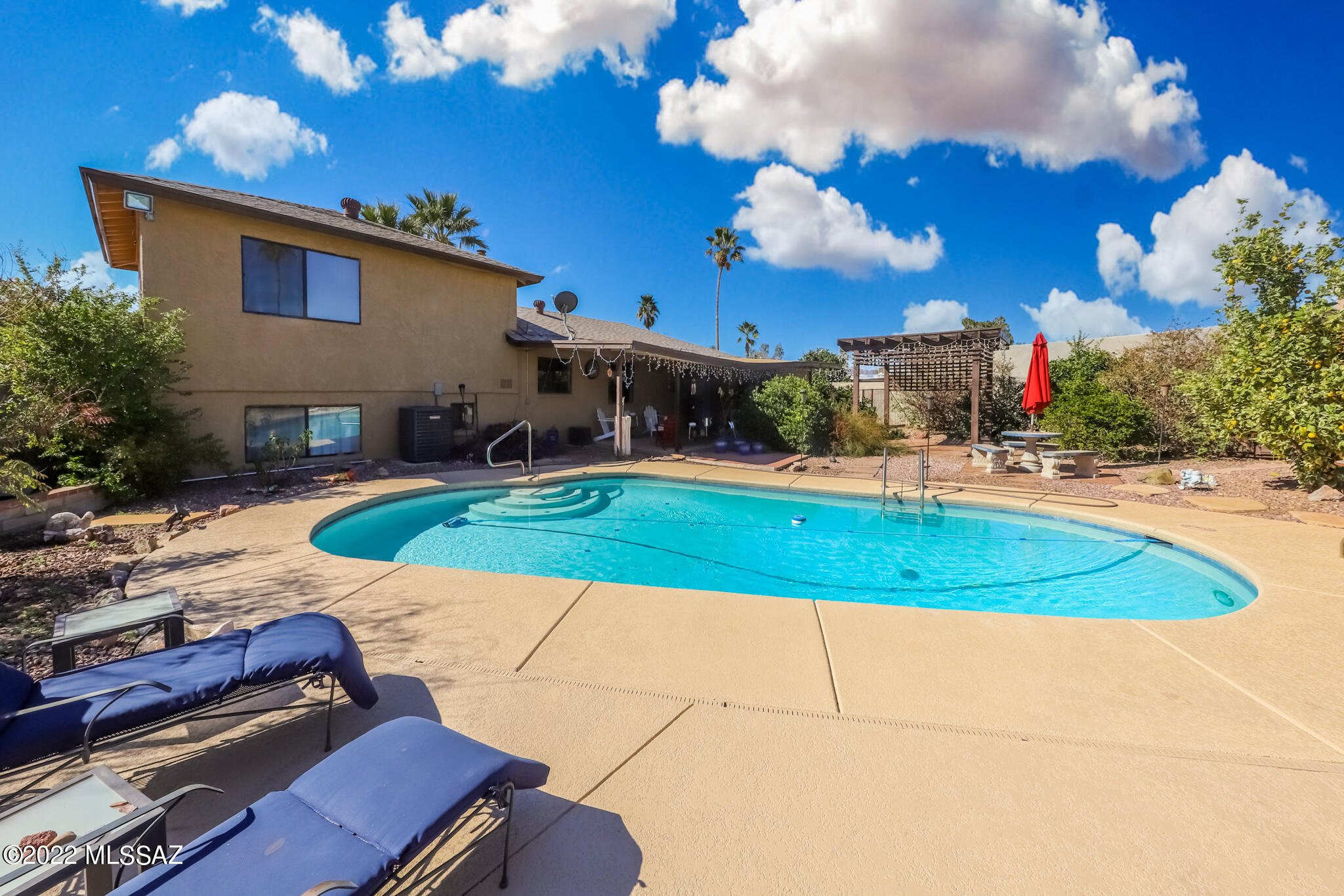BEAUTIFUL HOME WITH BACKYARD OASIS! This unique home boasts with pride of ownership.This multi-split level home has 4 bedrooms, 2 bathrooms, with a large lot. Backyard has POOL, hot tub, fireplace with seating, 2 ramadas, built in BBQ, and tons of room for entertaining! Perfect way to beat the summer heat! No HOA! Lots of upkeep and maintenance has been done throughout the years. Large family/living room. Please see docs for additional upgrade/upkeep information.