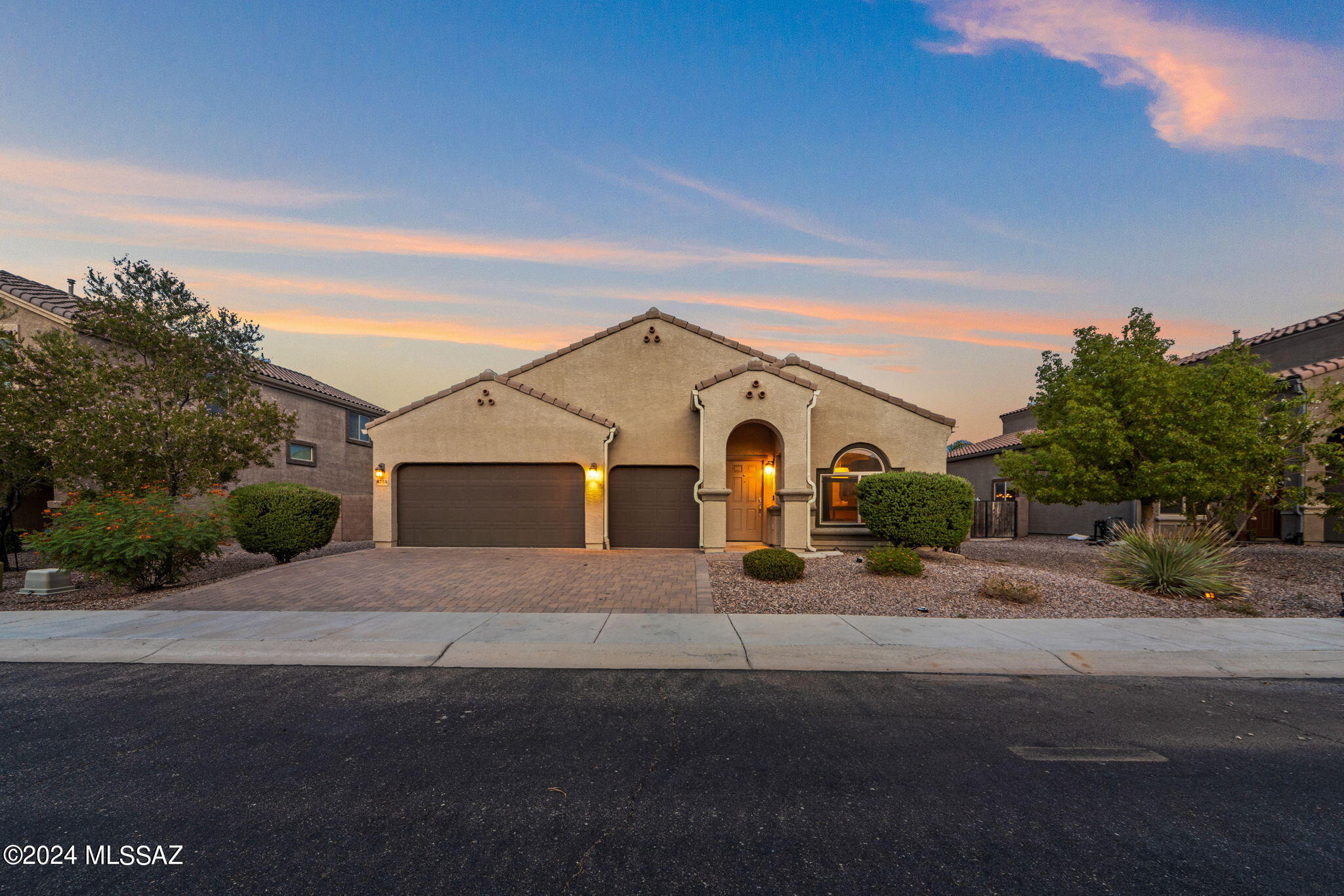 Discover your dream home in Saguaro Bloom! This meticulously maintained 3-bedroom, 2-bath plus 3 car garage home is loaded with upgrades, including  remodeled bathrooms and a spacious den perfect for an exercise room or office. Many upgrades were completed in 2022, ensuring modern comfort and style. The beautifully finished backyard offers a personal paradise, complete with a hot tub to melt away the troubles of the day! Add to peace of mind through the existing home warranty effective into May 2025. Don't miss out on this unique opportunity—call today to schedule a showing and discover more of the unique features of this remarkable home!