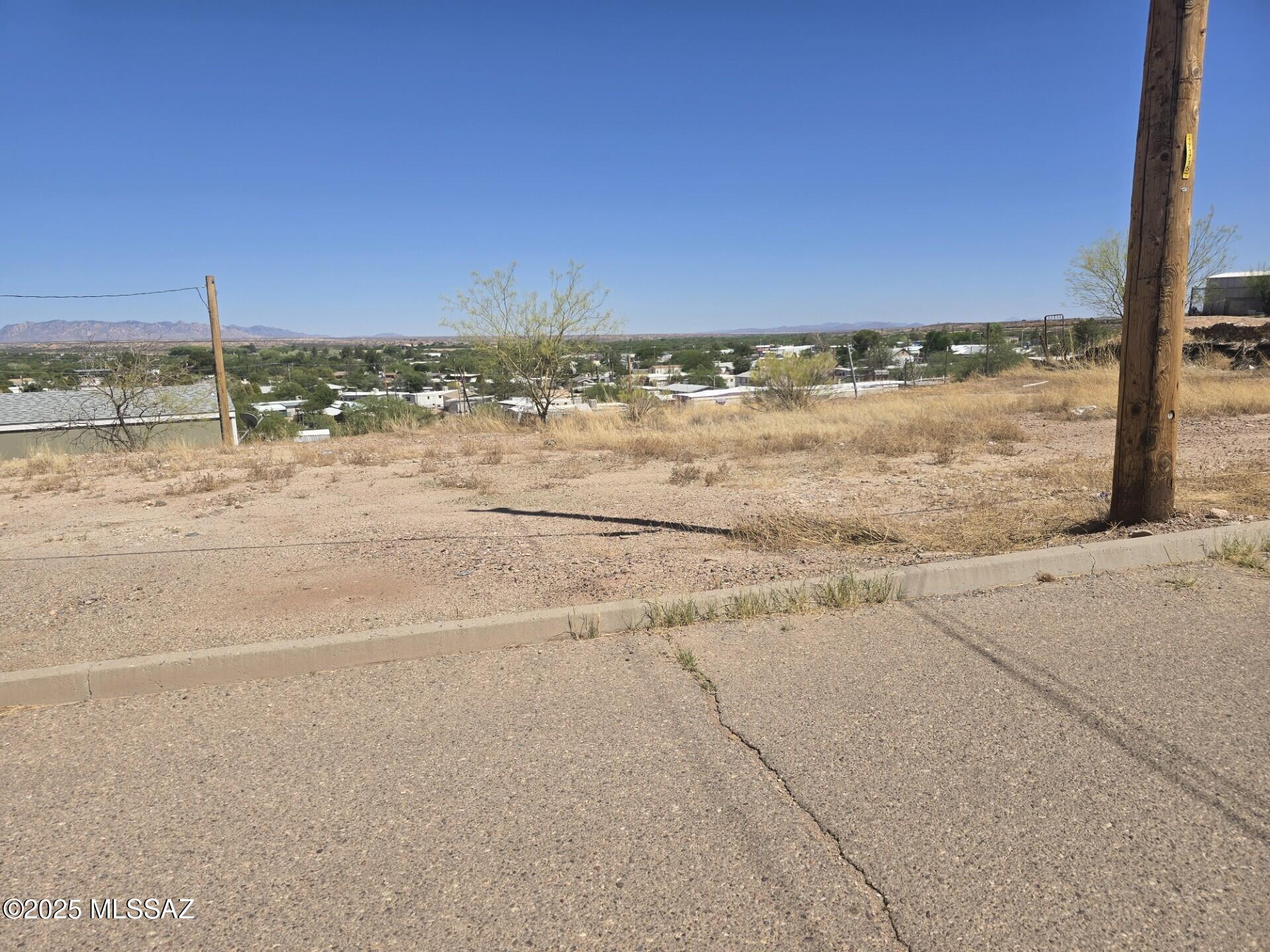 Cleared lot ready for your dream home, with fabulous views!  Close to restaurants and shopping. All utilities already on site, including city water, gas and sewer.  Electric service already at home site also.
