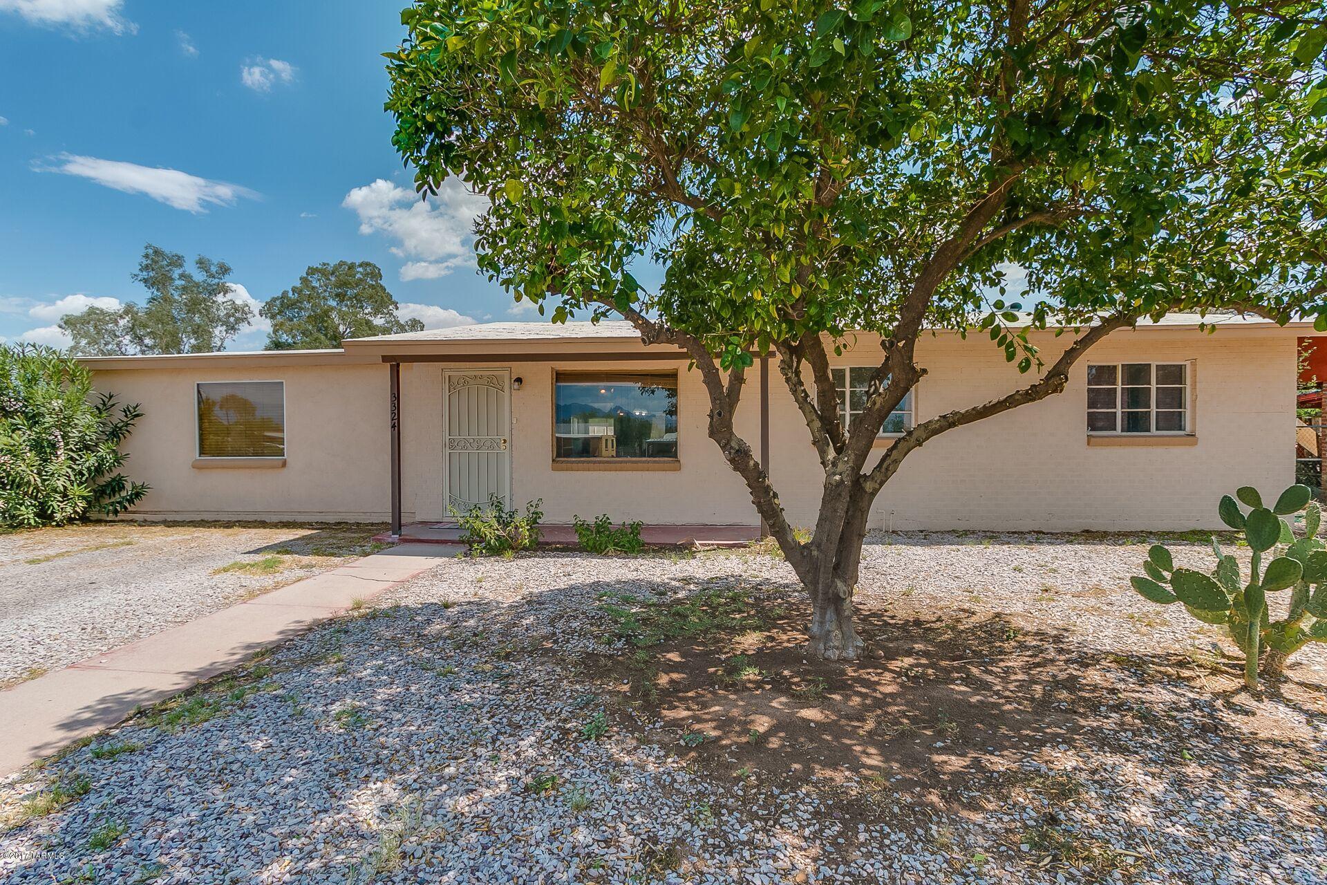 !Opportunity Knocks! 1,975 Sq. Foot updated 4 bedroom, 2 full bath home on one of the largest lots in Country Club Park, and a PRIVATE POOL! Large great room perfect for entertaining, dinning area with mountain view plus  kitchen with eat-in bar. Split bedroom plan. Master bedroom suite with adjacent office/den and laundry. Corner lot with huge backyard and pool make this property stand out from all the others in Country Club Park. Easy commute to downtown, U of A, and shopping along Broadway. With a new roof (price reduced to reflect cost) and some TLC this house is perfect for the buyer looking to make it their own.
