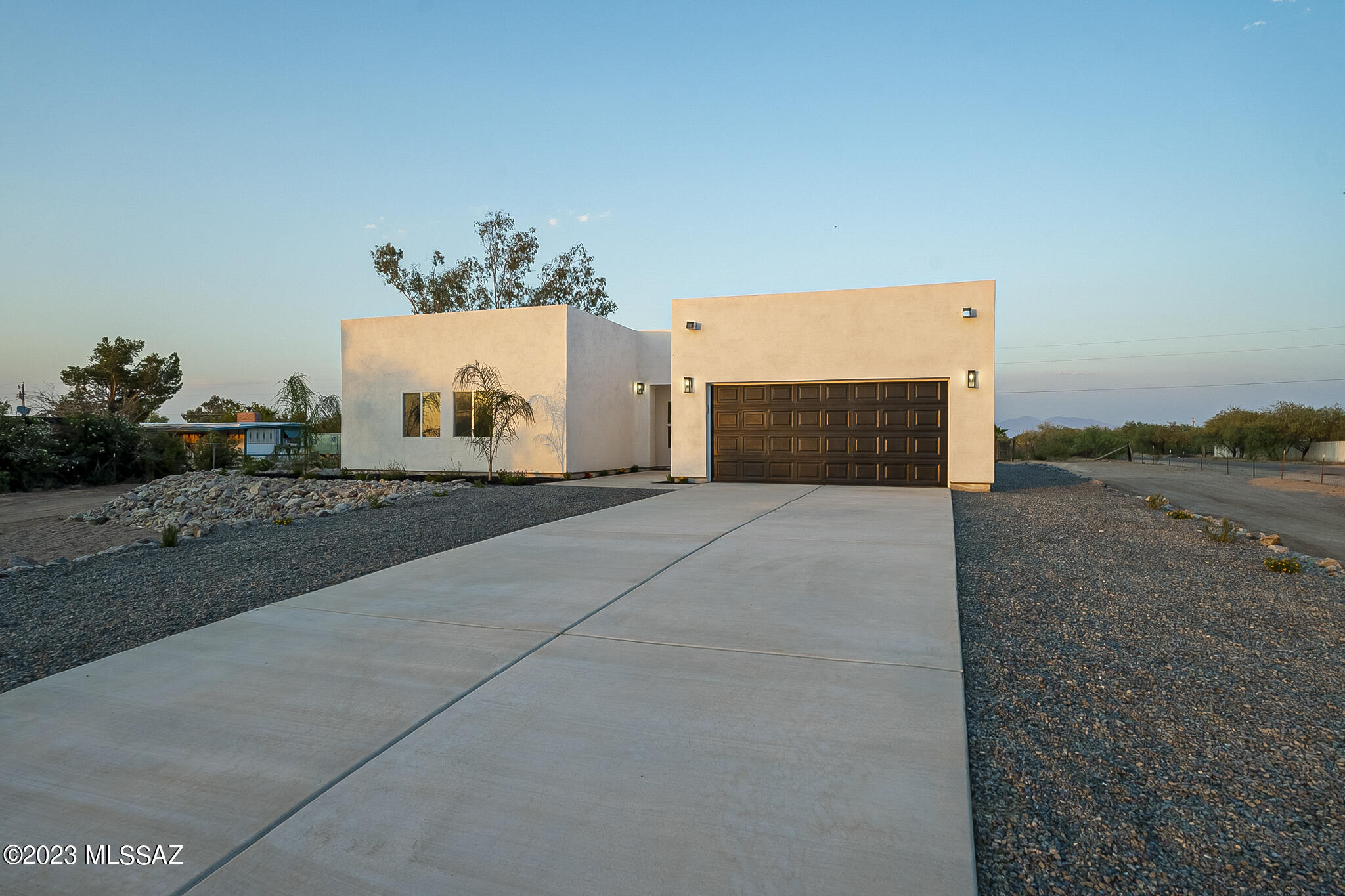 Experience Rural Living with Modern Twist in this brand new (2023) 4 -bed, 2-bath home on 1 acre. Enjoy 2,082 sq ft of open space with 11 ft ceilings, flooded with natural light. The kitchen boasts stainless steel appliances, a kitchen island, and quartz countertops. The master bedroom features 9 ft ceilings and looks out to a full-length patio with stunning sunset views. Additional highlights include a 2-car garage, horse-friendly grounds, upgraded lighting, and a white-on-white color scheme. Don't miss this serene retreat with luxury finishes throughout!