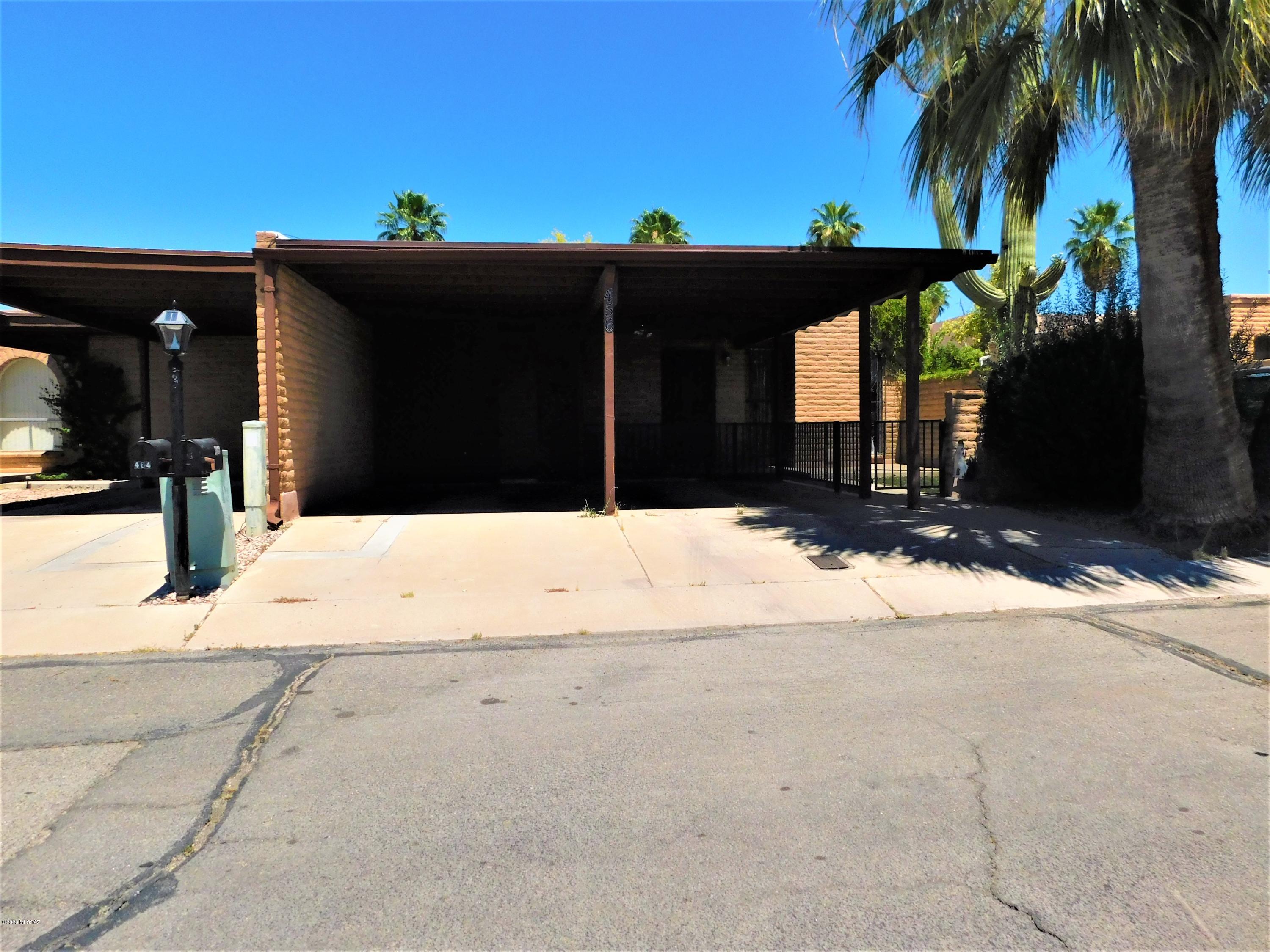 Spacious town home in a great little community awaiting its new owner.  This home features a large living area with a cozy fireplace, kitchen with breakfast bar and plenty of space for a large dining room table.  There are 2 covered parking spaces, covered patio and plenty of storage!  Home needs some TLC so the price is below market AND the owner will provide a credit/pay repair invoices toward repairs, paint and flooring at closing!