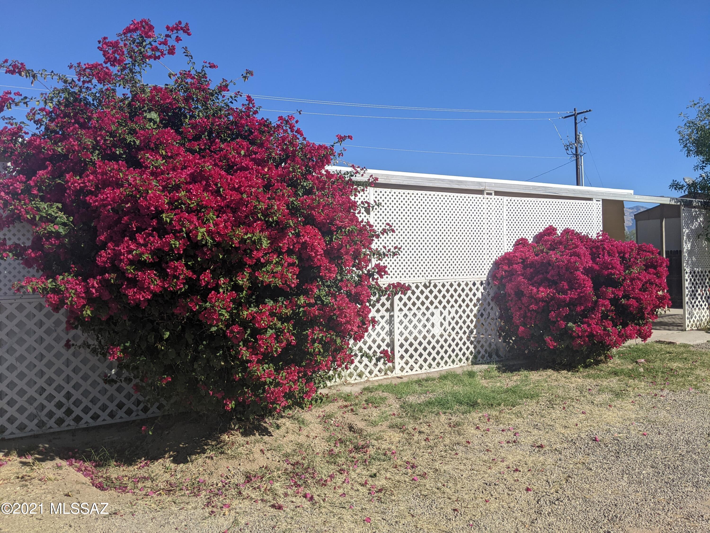 This is a Fleetwood MFH with 2 master suites. They both have their own full bath, walk in closet. Plus there is a guest bath with storage. A laundry room with stackable washer and dryer. Covered front and back porch. Steps up to the unit.  Kitchen has all appliances and pantry open to great room. Fenced in backyard.  Storage Shed is available.  Pets upon approval.  NO CATS.