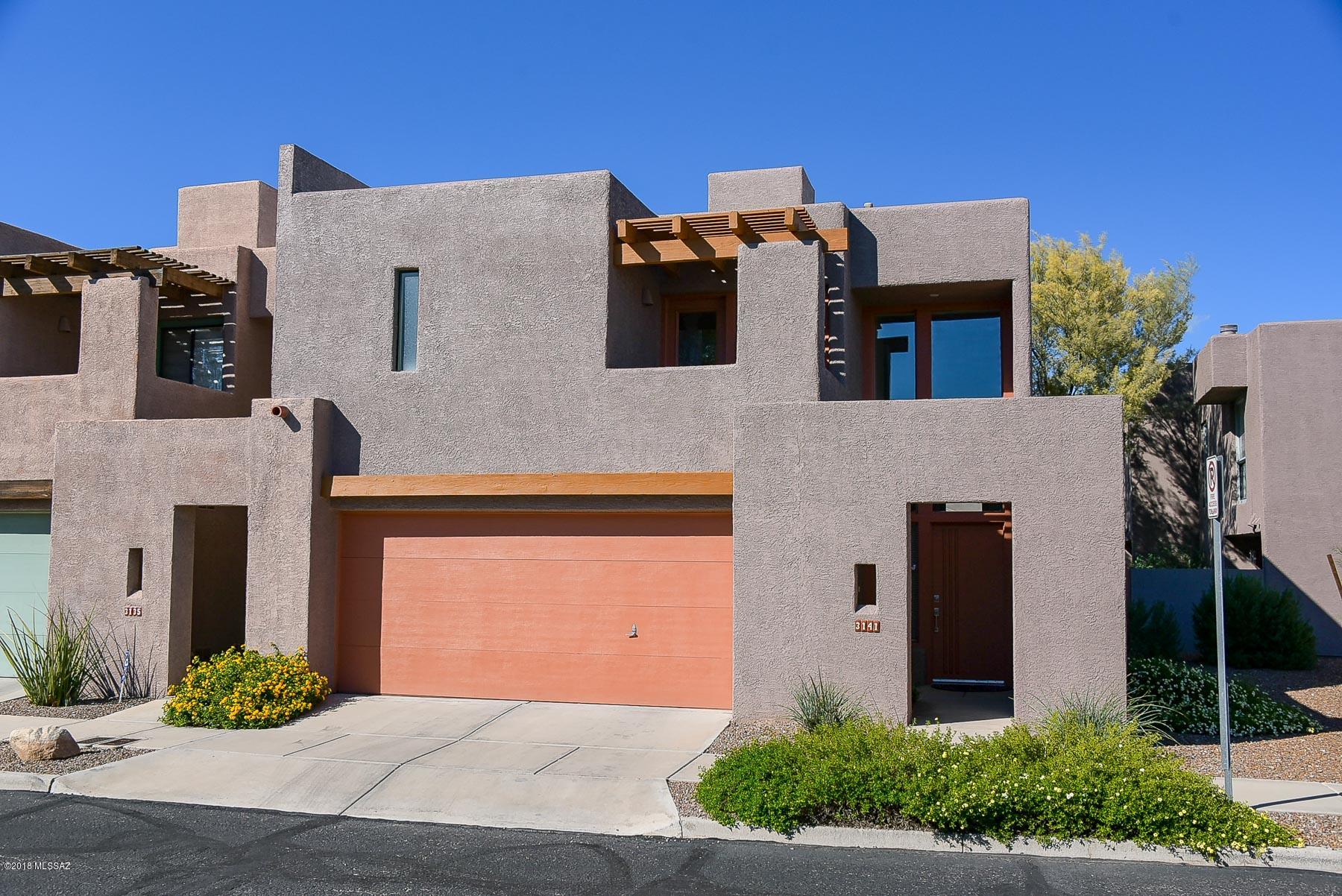 Beautiful newer built town home in a location close to everything Tucson has to offer.  You'll enjoy low homeowners Association fees in a small 32 unit neighborhood.  Tucson Racquet & Fitness is just down the street.  The Loop is practically out your front door for 132 miles of  walking and biking. Close to the U of A, Near Banner University Medical Center, Diamond Childrens Hospital, Brandi Fenton Park and so much more.  Washer Dryer and refrigerator stay!