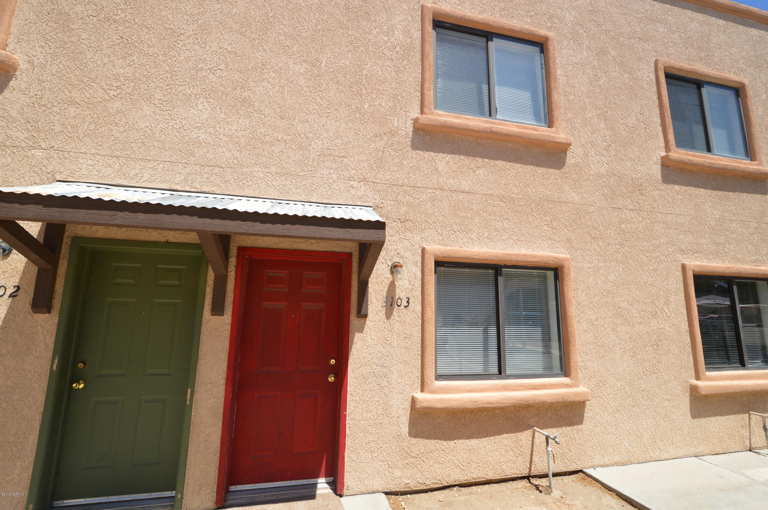 Phenomenal value in modern Townhome! Two large bedrooms and two full baths. Gourmet kitchen with range, refrigerator and stack washer/dryer included. Bright and cheerful in small quiet complex. Close to Speedway/Columbus with easy access to everything.  Just 2.5 miles from U of A!! Fenced yard for kids and approved pets.  Efficient heat pump and dual pane windows for comfort and economy.  Military welcome! Dont let this one get by, CALL NOW!!