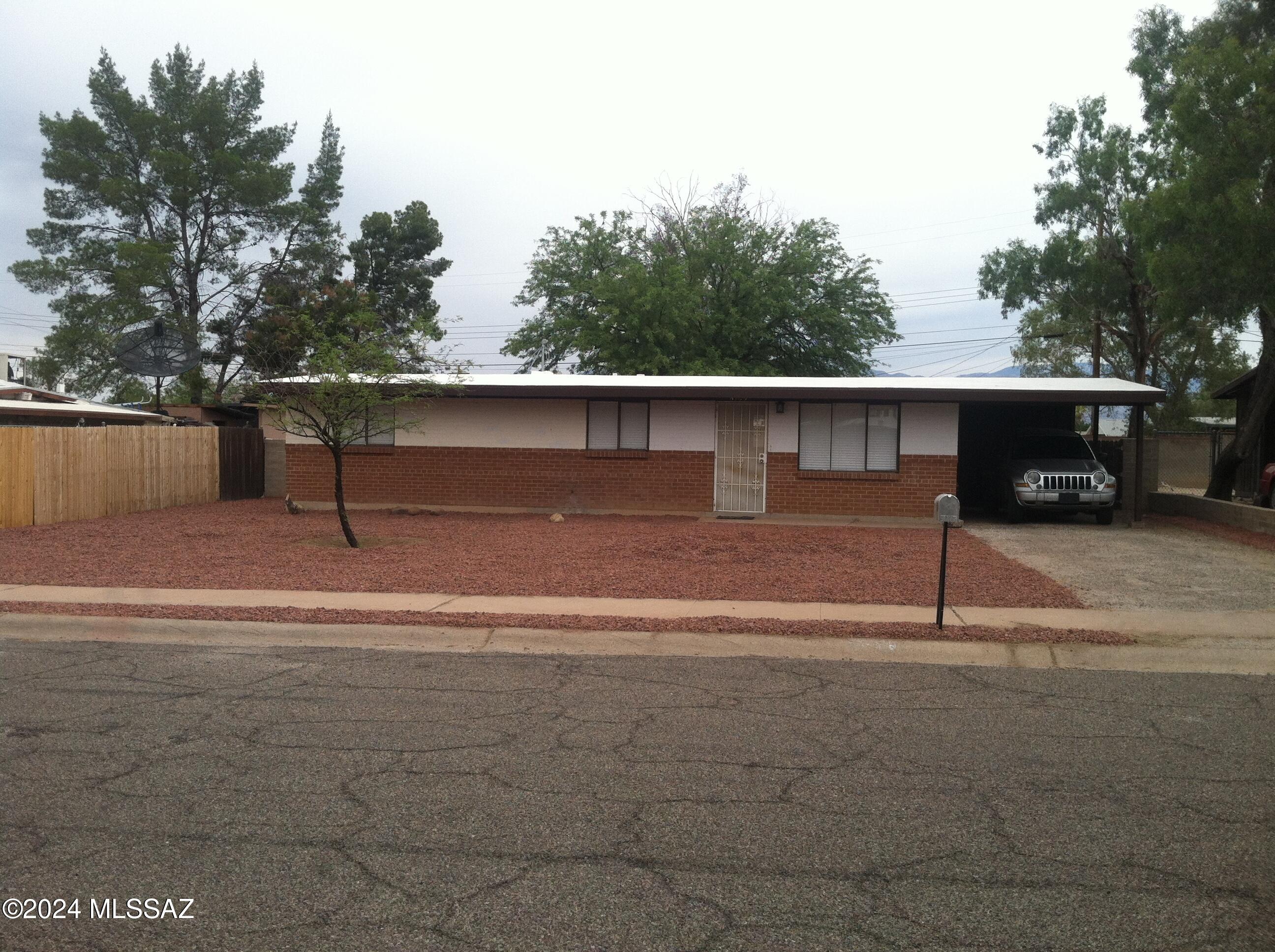 Wonderful 3 bed 1 bath home in Tierra Del Sol. Home has central A/C & has been completely updated w/ newer tile flooring throughout, newer light fixtures, newer plumbing fixtures, & newer granite counters. Large block enclosed backyard w/ storage & 1 car carport. Appliances included: refrigerator, dishwasher, oven/stove, and garbage disposal. Rent $1395, Security Deposit $1550, $30 Application fee per adult, Pet Fee: $100 per pet w/ $25 pet rent per pet. Landlord's application requirements are as follows (and will be verified) : Current/recent rental history in good standing, No history of eviction, monthly income of at least 2.5 times rent. Owner/Agent One of the Managers of Calden Properties LLC, has a real estate license in the state of Arizona. Please contact Arthur at 520-270-4985