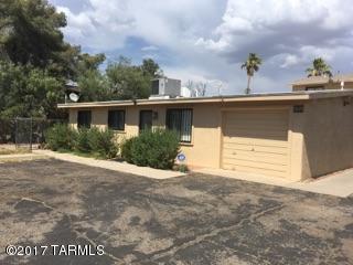 968 sq. ft. house built in 1957 with attached garage and 2 story duplex (1050 sq. ft. each) on large lot with plenty off street parking, gated (although tenants choose not to engage gate), POOL, fresh exterior paint, NEW roofs ($8,500) just installed. Units are in good condition. Rents are in process of being raised slightly. Figures are therefore proforma. Pool and landscape maintenance is ''contract services and maintenance supplies''. Manager is 10% of gross rents. Plenty of opportunity to increase your return.