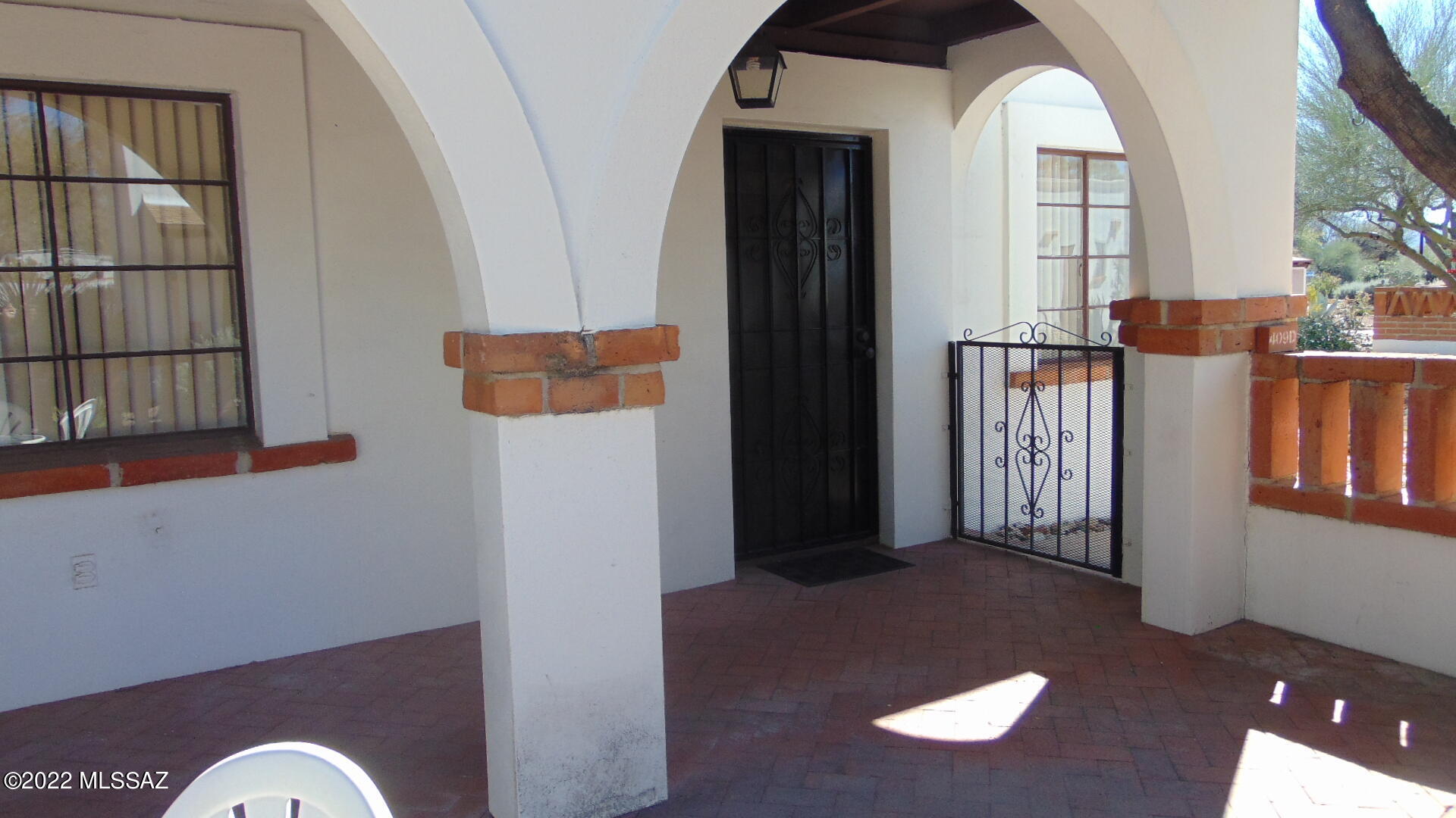 Unfurnished two bedroom/one bath end unit in the over 55 community of Villas East. Freshly painted with nice front patio, and one assigned on street parking slot. Gas range and gas forced air heating and cooling.