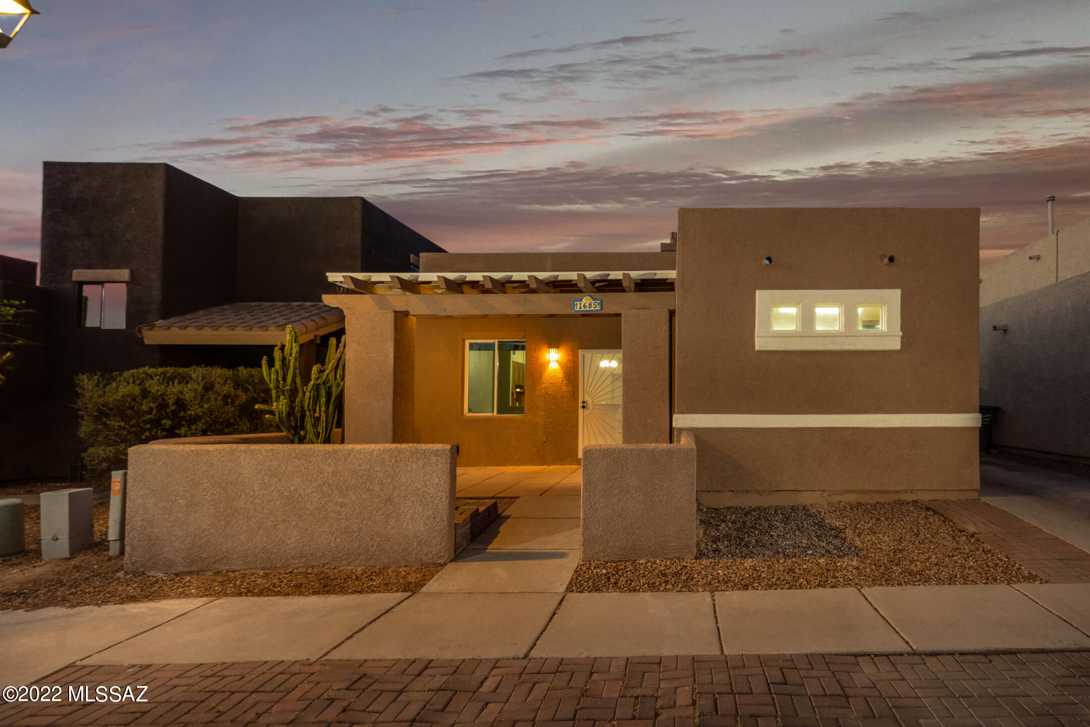Great home with natural light and high ceilings! Kitchen features a large island with a breakfast bar that makes entertaining family and friends feel more like a night out than at home. Large windows are aesthetically pleasing and give you a nice glimpse into the backyard and covered patio that is open to your creative possibilities. Primary bedroom is large with dual walk-in closets making storage convenient. Your next chapter starts here!