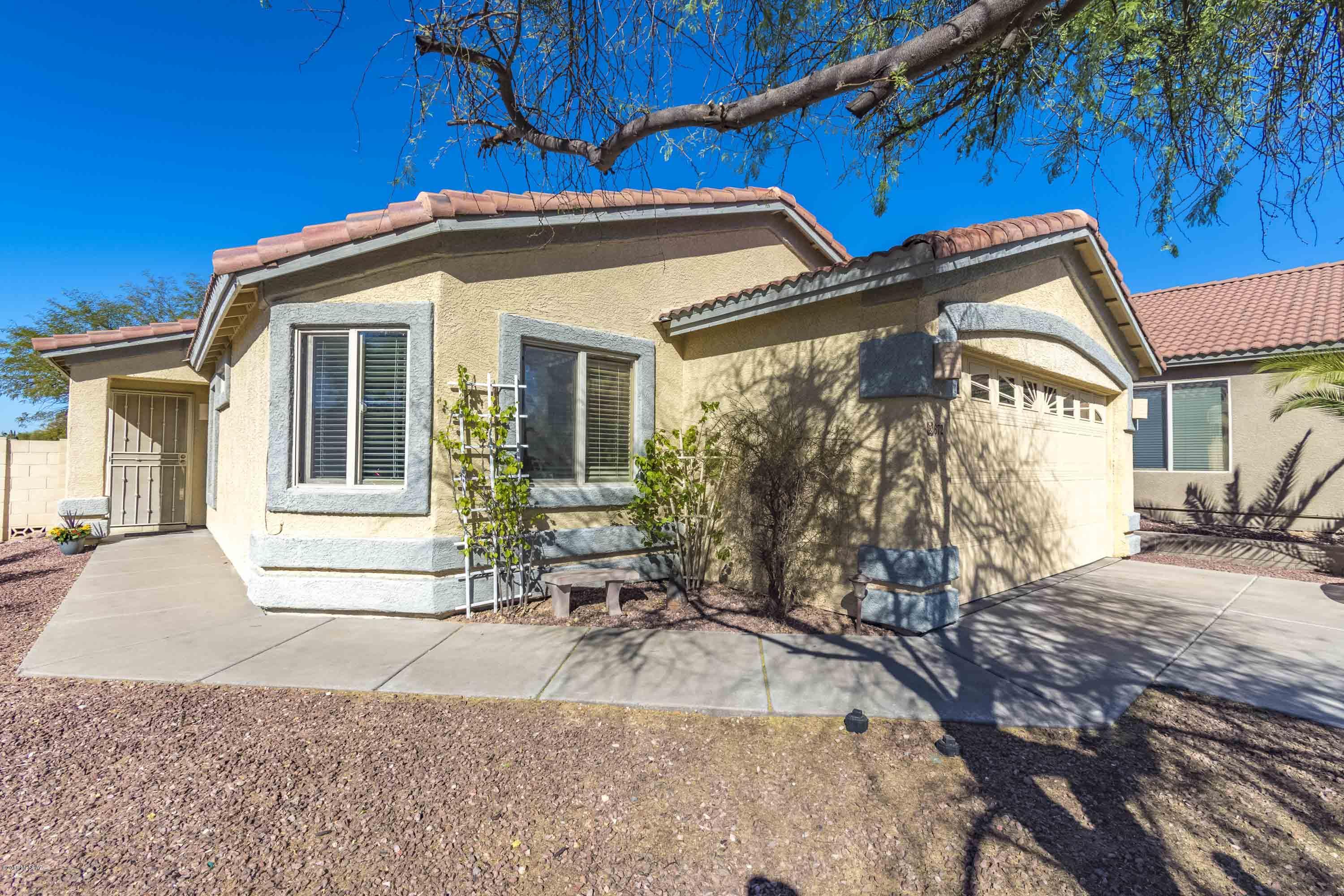 Newly Painted 4/2 with great room and split bed floorplan, vaulted ceilings, privacy, and mountain views! Inside this home provides lots of tile, large great room, oversized kitchen, garden tub at master as well as large walk-in closet. 

Outside offers privacy (corner lot), backyard with  open space and abundant natural surroundings including mountain views, lots of saguaros, as well as sunset views! 

The property also features a dog run, and an extended driveway what provides ample room for cars or longer trucks! 

Priced to sell schedule your showing today!