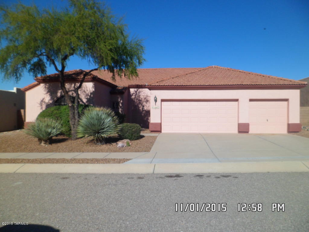 MODEL PERFECT WITH ALL THE UPGRADES. FEATURES INCLUDE STUNNING MOUNTAIN VIEWS FROM INSIDE AND OUTSIDE, TILE FLOORS THROUGHOUT, GRANITE TOPS IN KITCHEN, HIGH END STAINLESS APPLIANCES, VAULTED CEILINGS, DUAL SINKS IN BATHROOMS, LARGE 3 CAR GARAGE WITH WORK AREA & ZONED A.C. THE WONDERFUL LARGE TIERED FLAGSTONE BACKYARD WAS MADE FOR ENTERTAINING WITH STAINLESS BUILT IN BARBECUE, FIREPLACE, BUILT IN SEATING ETC.