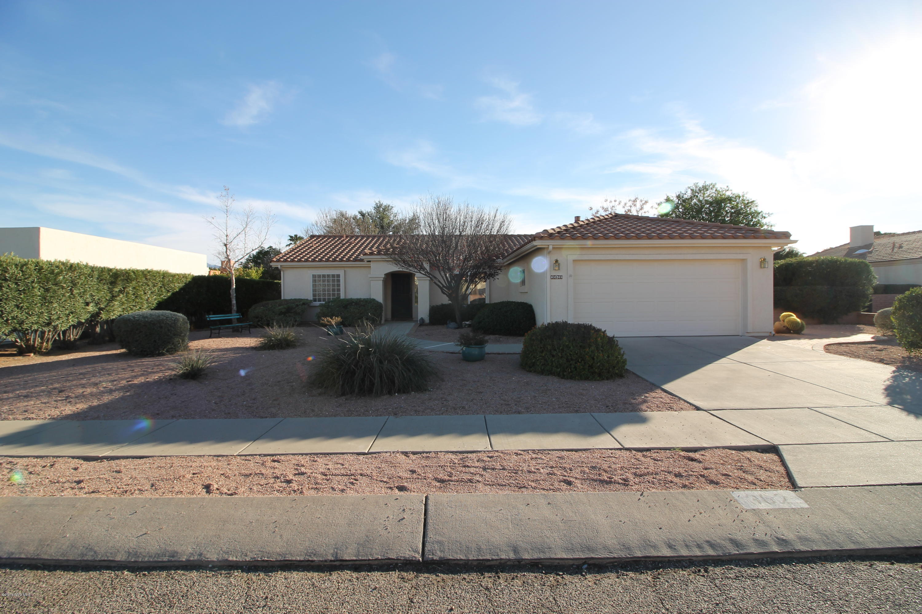 As you enter you will enjoy the open feeling of this split bedroom floor plan with cathedral ceilings plant shelves and built in storage. Tiled Arizona room with wood shutter blinds.Double vanity master bath with separate shower, jet tub and walk in closet Built in storage cabinets in the garage. HVAC is less then 2 years old. Newer appliances and washer/dryer.Private block walled backyard with fountain, mature trees and pave stone walks.