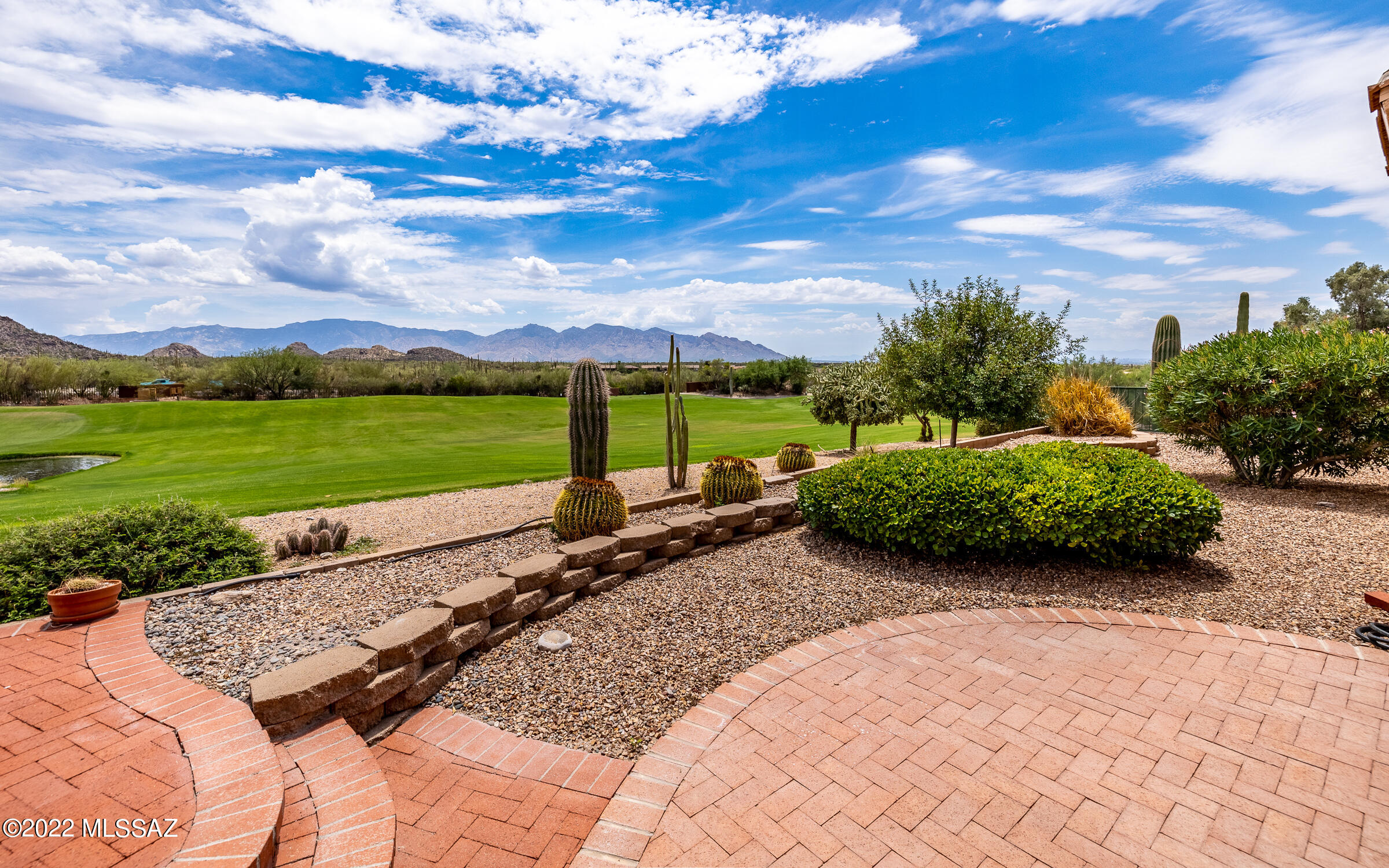 This is the Original Model of the Santa Barbara. On ''Model Row'' with some of the Finest VIEWS in the community. Overlooks the 12th Signature Hole of The Highlands GC. Incredible VIEWS of the Catalinas, Sunrises, Water Fall and More. One of the most highly sought out floor plans. This home has 2BR/2BA plus DEN and Front BONUS ROOM. Spacious Family Room. Entertainer's Kitchen w/Granite Counter Tops, Extended Wood Cabinetry, Butler's Pantry and All Appliances. Huge Laundry Room. Formal Dining Room. Den w/Double Doors. Large Covered Patio with Gas Grille and Raised Brick Paver Seating area. Its the VIEWS that will take your breath away. This is the one. Call for a personal showing.