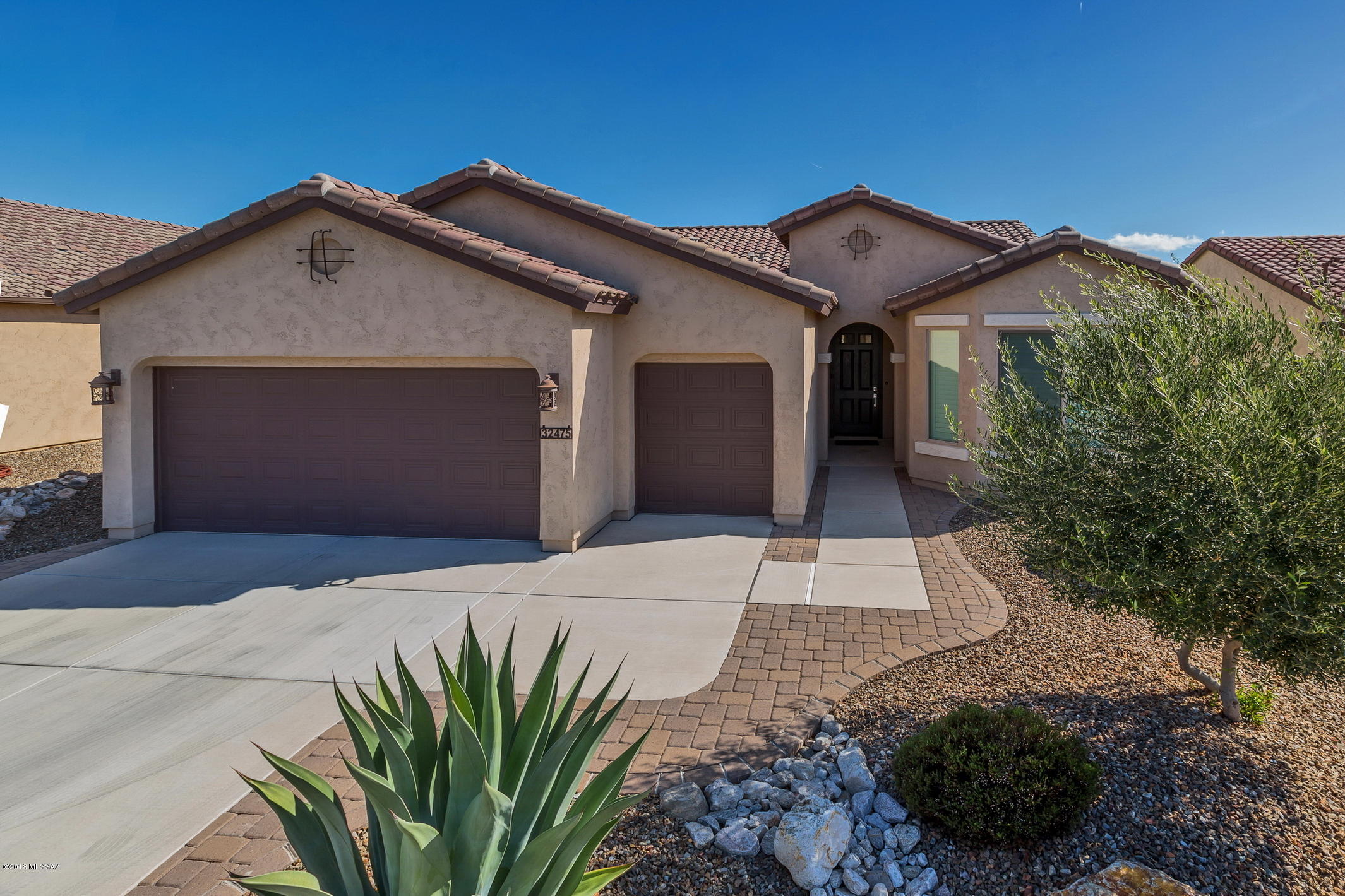 Ready for immediate occupancy, start enjoying your active life style now in this immaculate Dolce Model located in the 55 plus gated community of Saddlebrooke Ranch. Fine living is the standard with top of the line features such as; Custom Hunter Douglas window treatments, plantation shutters, ceiling fans, upgraded full overlay maple cabinetry, under cabinet lighting, Casearstone countertops, full height tile backsplash, Delta stainless pull-out faucet, SS appliances, 18” floor tile, bay windows at MBR, BR2 & Dining, 4’ garage extension, utility sink at garage, soft water loop, BBQ stub at patio. All this and more.