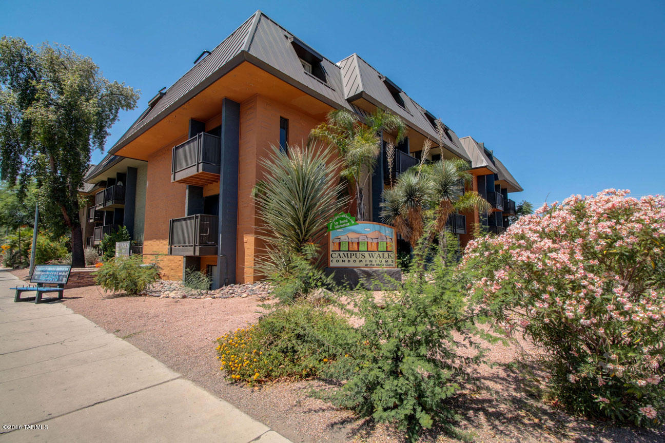 Beautifully remodeled Campus Walk unit just 1 block from UofA's main entrance and University Avenue shops, restaurants and Streetcar.Best location in the complex off busy street with patio overlooking pool. Rare two master suites with 2 private connected bathrooms + additional 1/2 guest bath on main floor. Full size washer/dryer INSIDE unit. Fully remodeled kitchen with granite counters. Both bathrooms remodeled. Downstairs has custom travertine tile throughout. Excellent rental history.