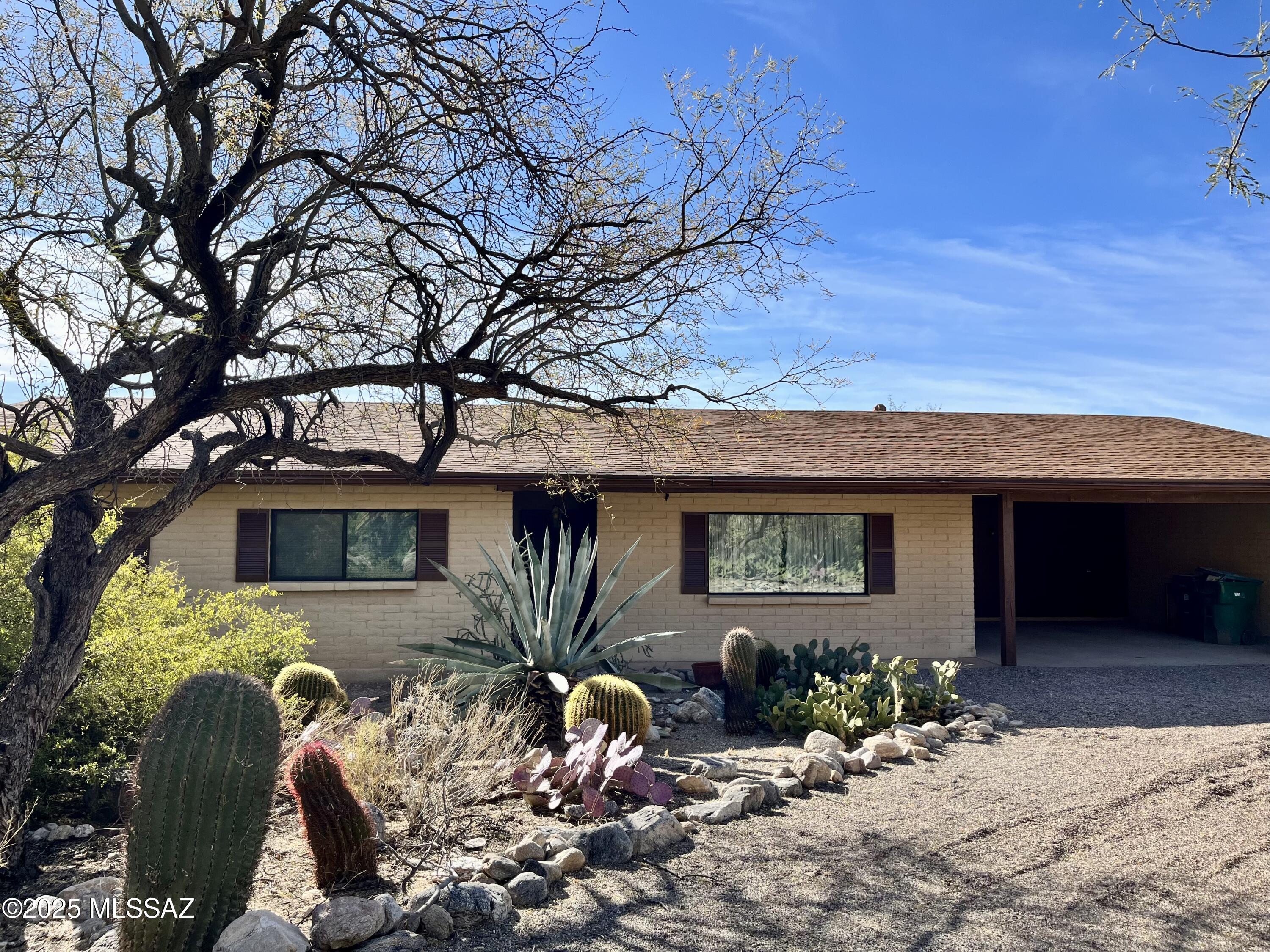 1,942 SQ FT! 3-Bedroom, 2-Bath Home in Tucson's Coronado Foothills Estates This desirable single-story home features a charming kitchen equipped with included appliances: dishwasher, microwave, oven, and refrigerator. A washer and dryer are also included for added convenience. The great room layout offers seamless living and entertaining, complemented by neutral flooring throughout. The home boasts three generously sized bedrooms. Step outside to enjoy a stunning backyard with a sparkling pool, a spacious patio, and breathtaking mountain views. Conveniently located near schools, parks, dining, and entertainment in a sought-after Tucson neighborhood.