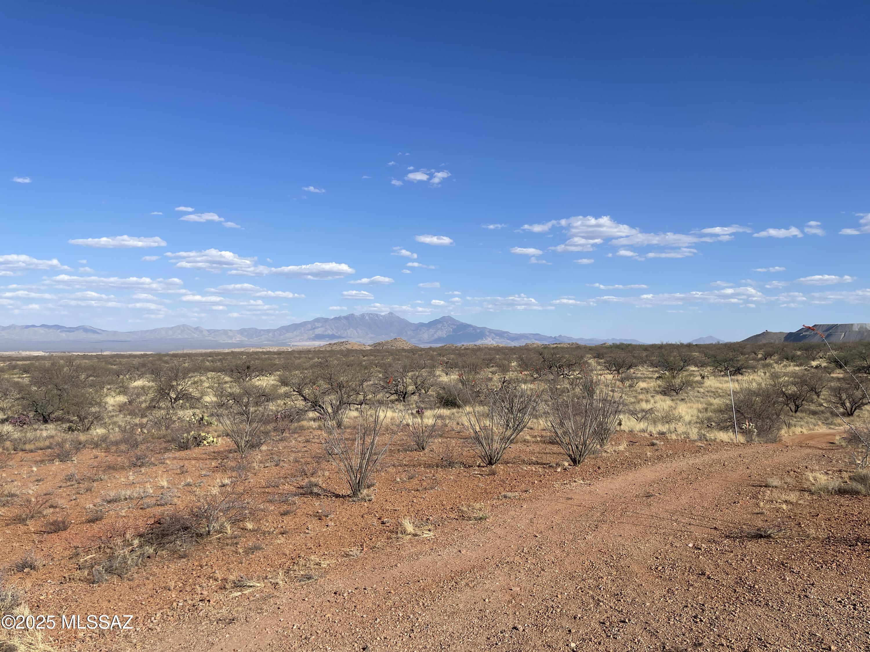 Two Lots totaling over 8 acres. Power running through the lot with a shared well. Perc Test performed 2020. Gorgeous space in the private gated Flying Diamond Airpark.  Custom properties throughout the neighborhood ranging from large shops and barns to airplane hangars. Bring excitement and serenity to your life and move to your own lush desert oasis. Blank canvas to build your dream property.
