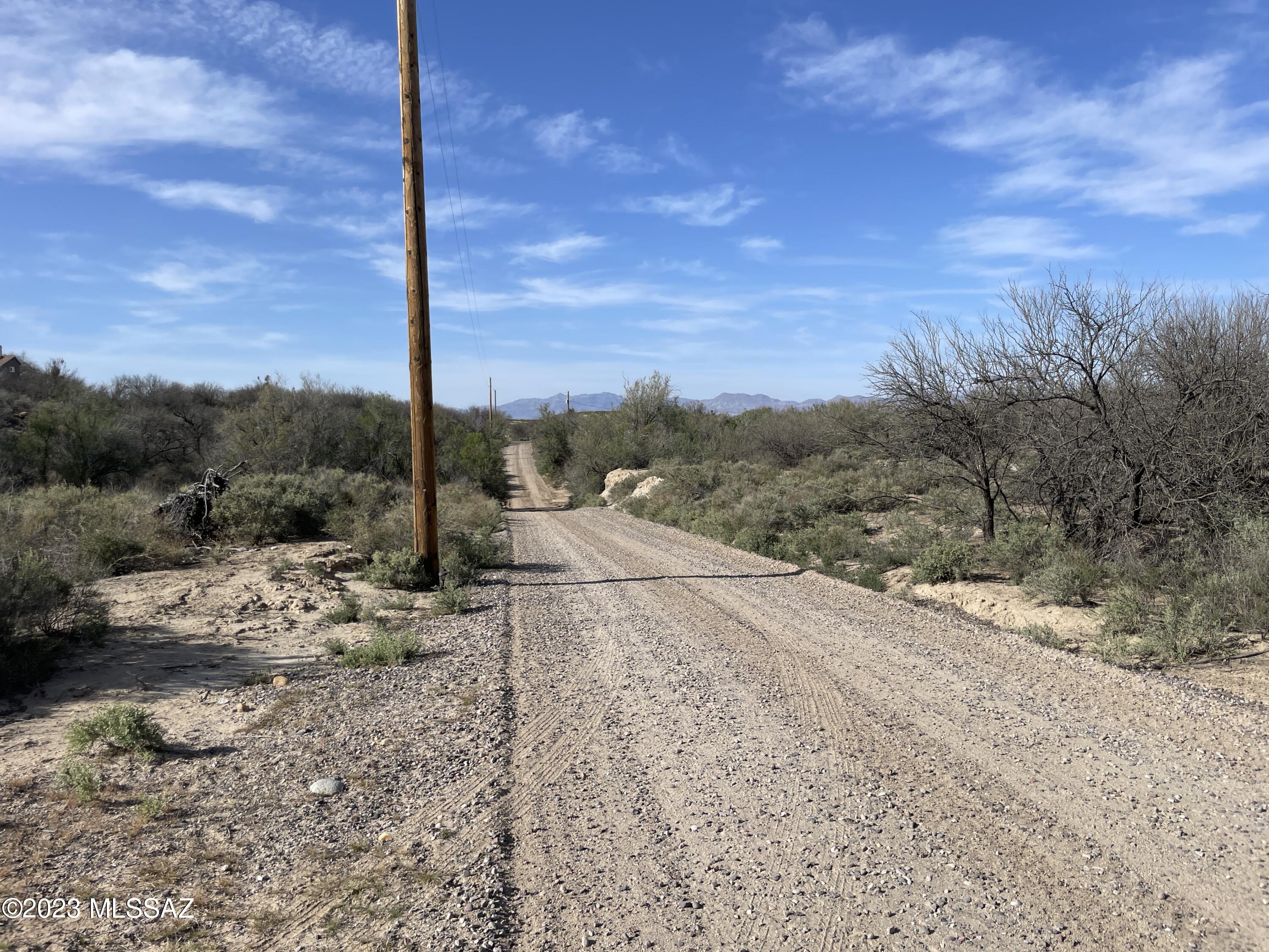 If you are looking for a place that is quiet and almost ready for your new home or a place to run livestock on your mini ranch.. look no further.  You have the Graham mountains as your background and an abundance of mesquite trees.  There is electric running through the property and a 6'' well casing.  Buyer to verify availability of water in well casing.  Parcels 106-28-006P & 106-28-006k