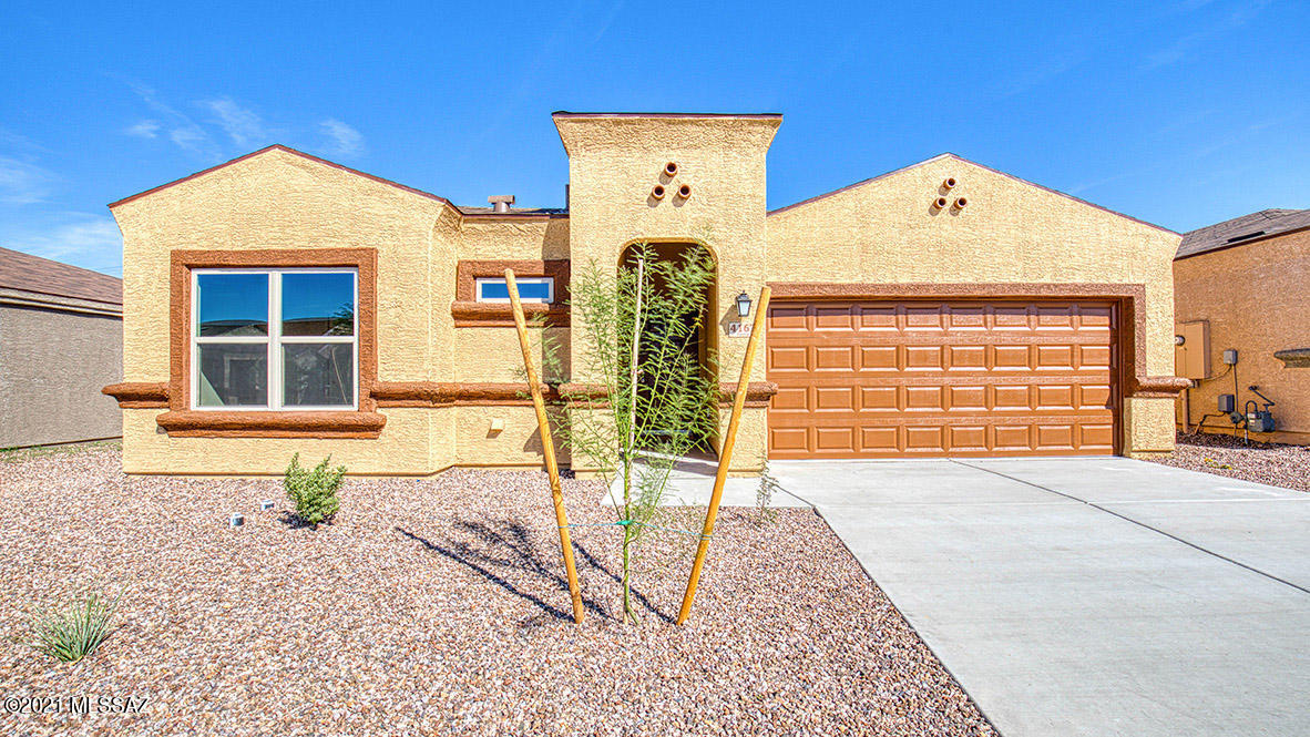 Home is currently under construction and status, pricing and/or availability may change at any time. Please call site agent at 520-600-4902 for an update on construction, status, pricing and availability. Homes may be subject to a waitlist for contract initiation where applicable.

Beautiful 3 bedroom home with an open floor plan. This home is situated on a great lot that backs up to open space and has  granite counter-tops, espresso cabinets, and tile in most of the home. This one won't last long.  Come take a look today!