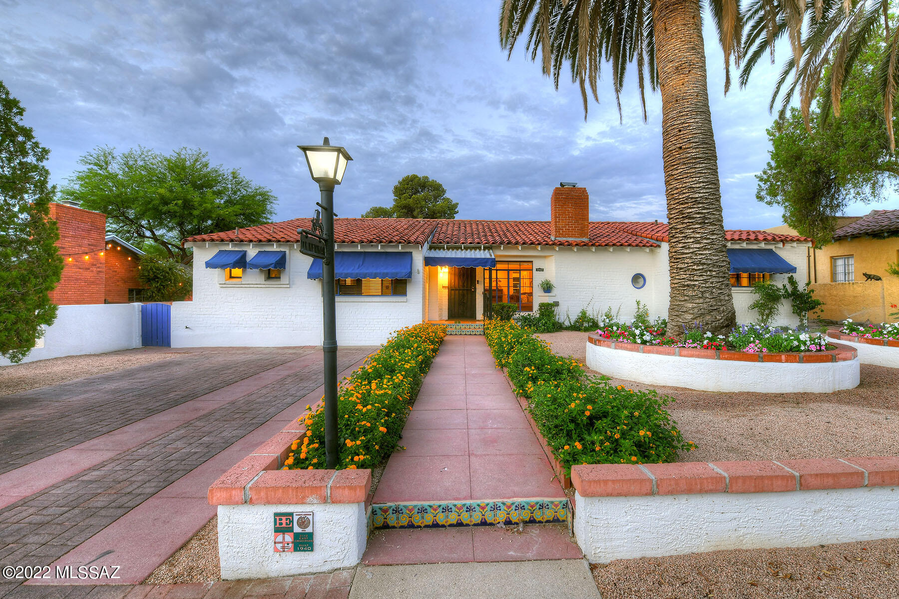 .Beautiful Bungalow near the Arizona inn.  This lovingly cared for and maintained home retains its original charm with its hardwood floors, vintage tiled bathrooms, master has two room suite w/two bathrooms. Hall bath was remodeled to reflect the time period, split 3rd bedroom has rec room w/bar ensuite bath, kitchen, w/ corner window, pantry & mudroom.  Arizona room has original integral colored concrete flrs.  Backyard has covered patio, fountain, brick pavers, fruit trees, garden beds, laundry room off large 2 car garage.  Walk to AZ Inn, Banner Hospital, the Modern Street car, UArizona and more!